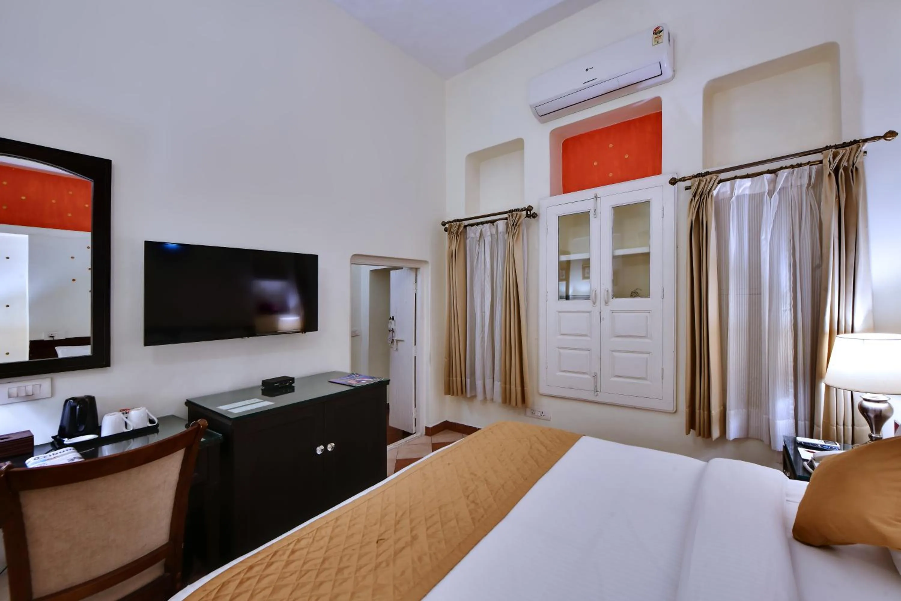 Bed in WelcomHeritage Ramgarh