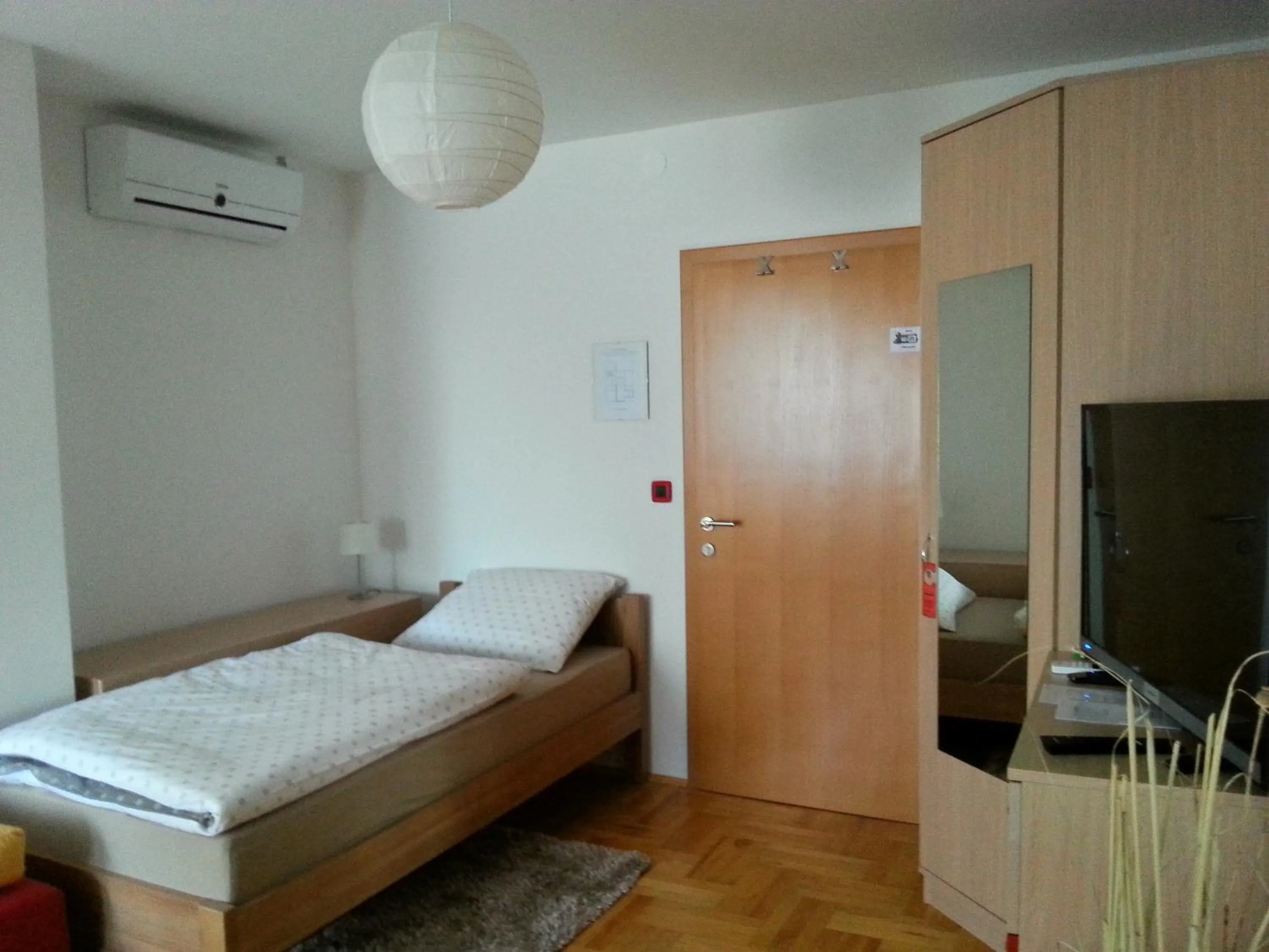 Bed in Studio Apartments Korosteljev