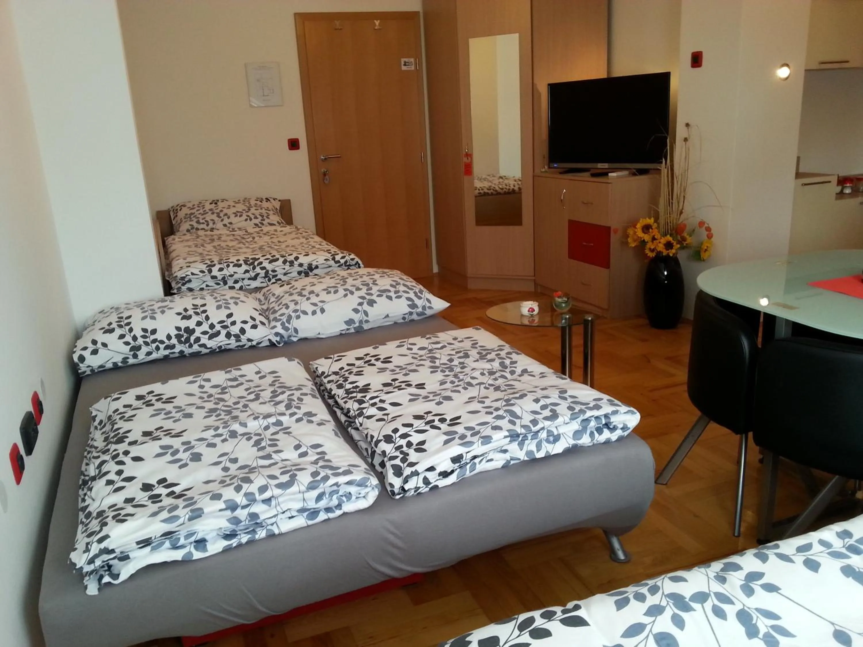 Bed in Studio Apartments Korosteljev