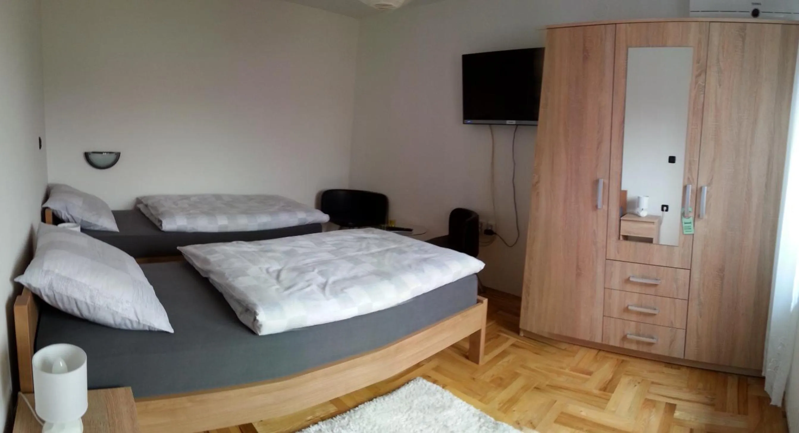 Bed in Studio Apartments Korosteljev