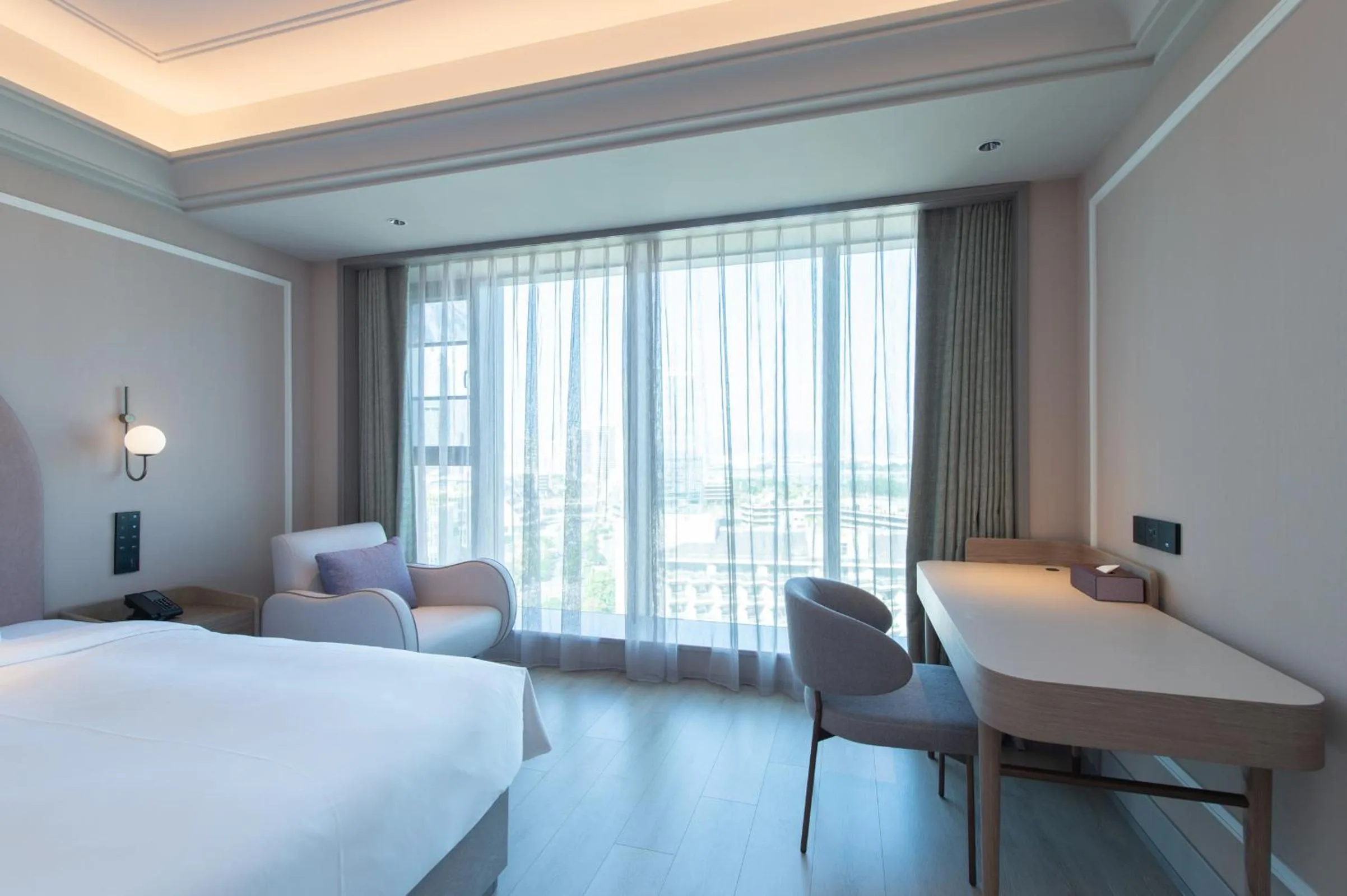 Living room, Bed in Mercure Xiamen Science City