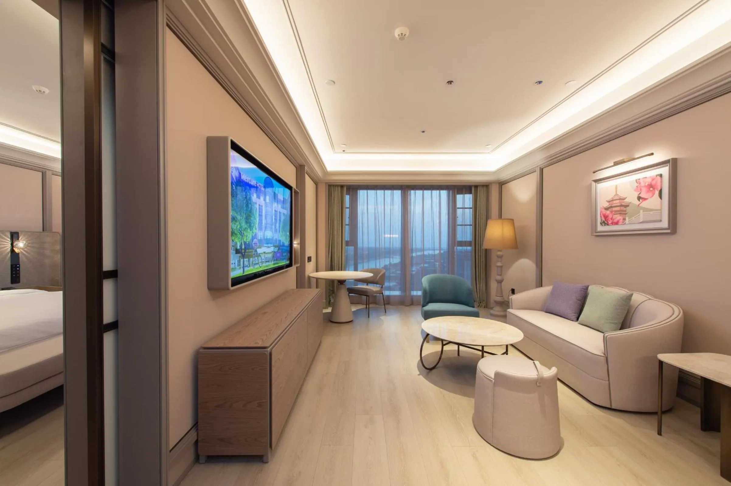 Living room, Bed in Mercure Xiamen Science City