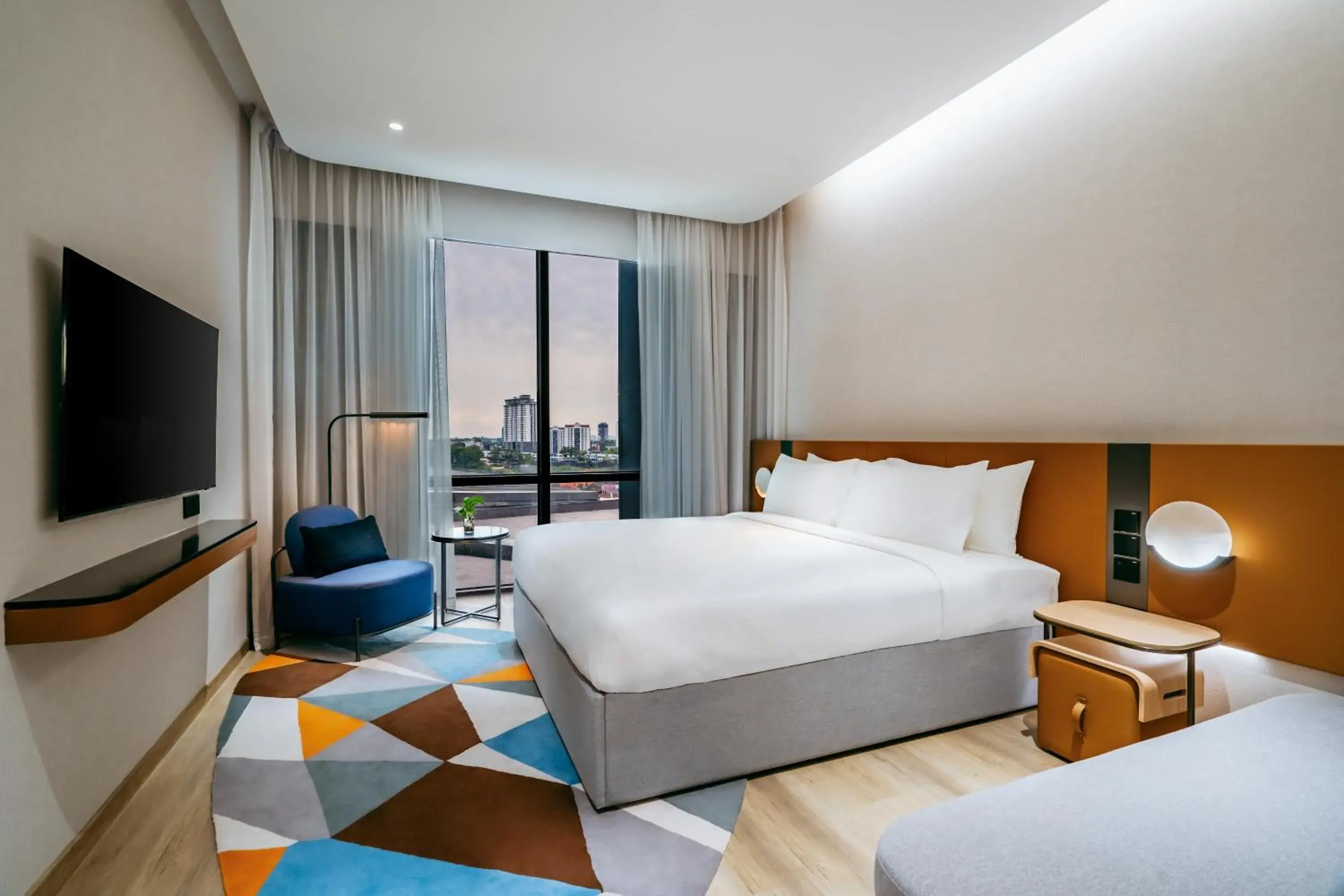 Family Room with One Double Bed and Two Single Beds in Novotel Johor Bahru City Centre Family Room with One Double Bed and Two Single Beds in Novotel Johor Bahru City Centre