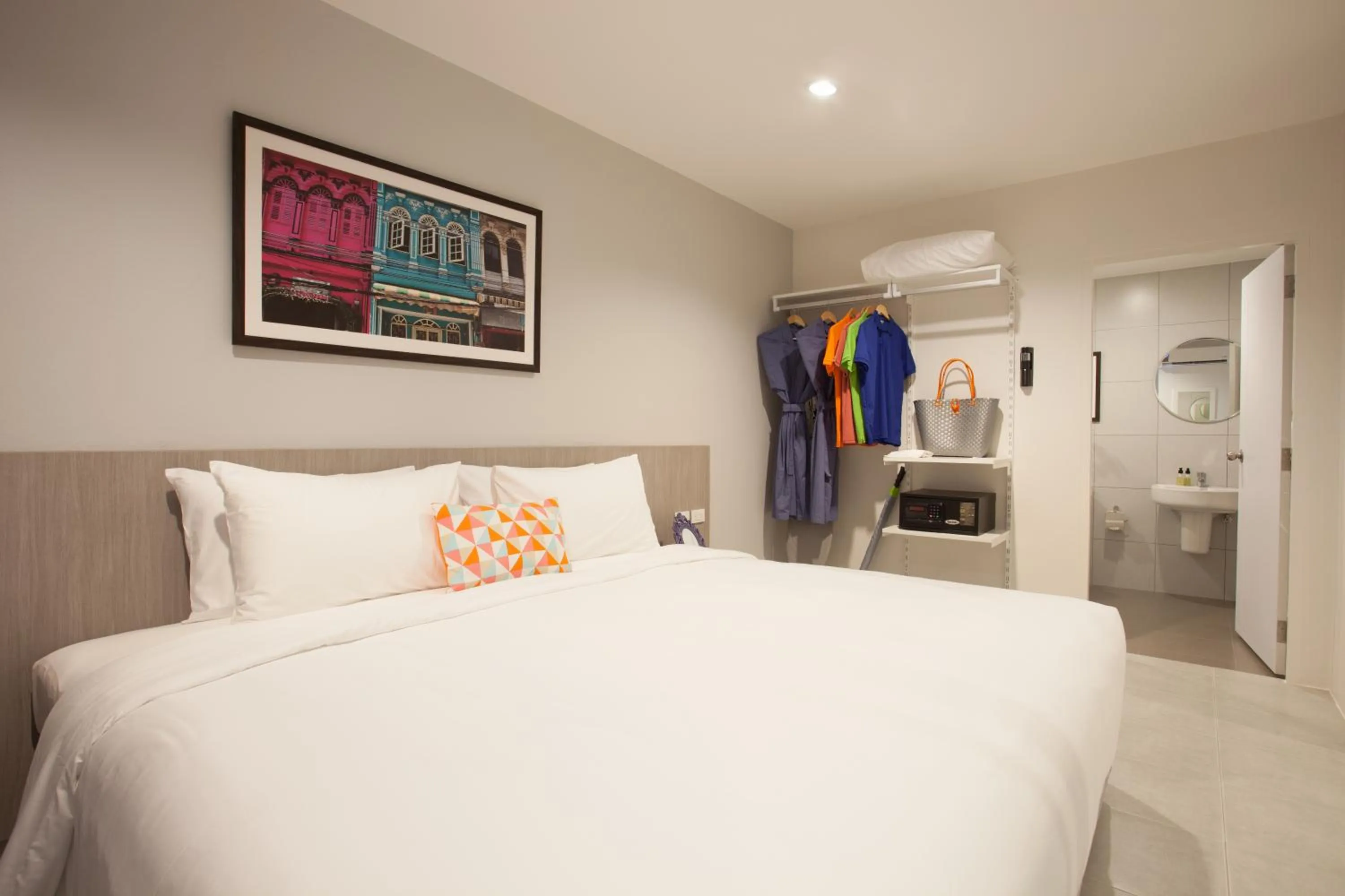 Bed in Recenta Suite Phuket Suanluang