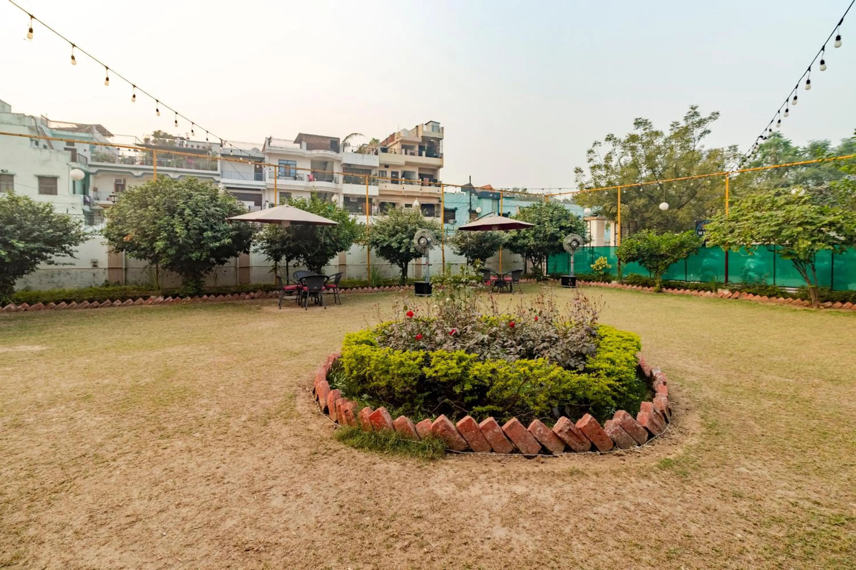 Garden in Treebo KGF Villa with Swimming Pool