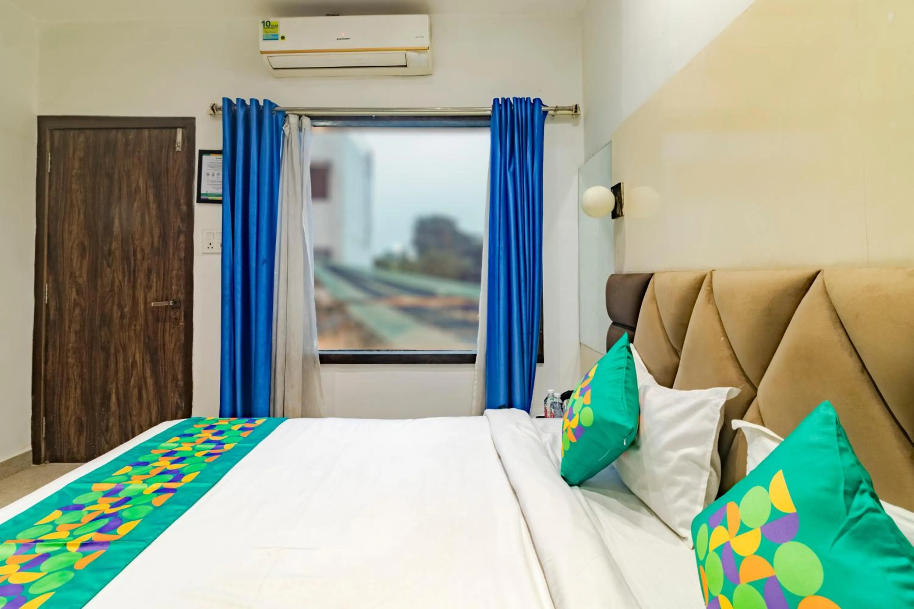 Bedroom, Bed in Treebo KGF Villa with Swimming Pool
