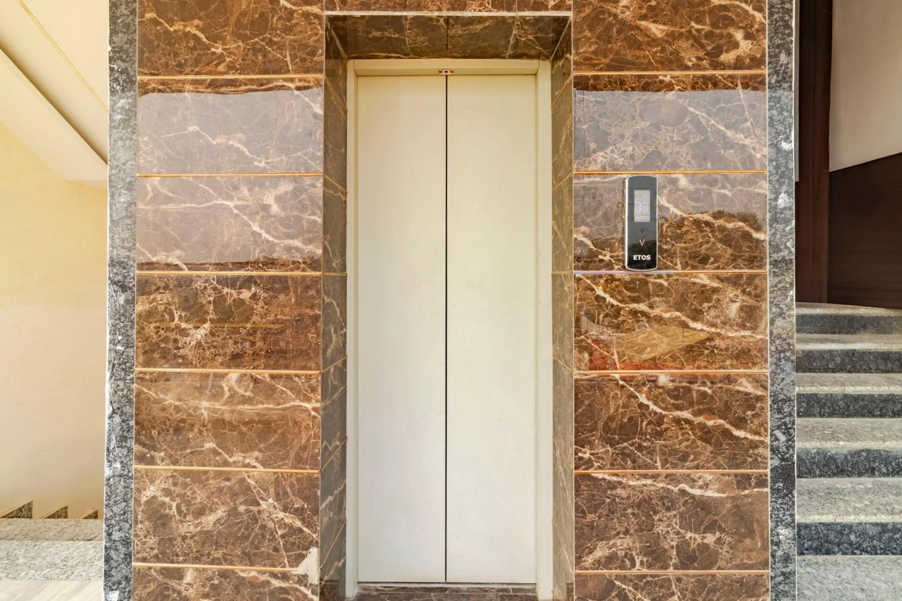 elevator in Treebo KGF Villa with Swimming Pool