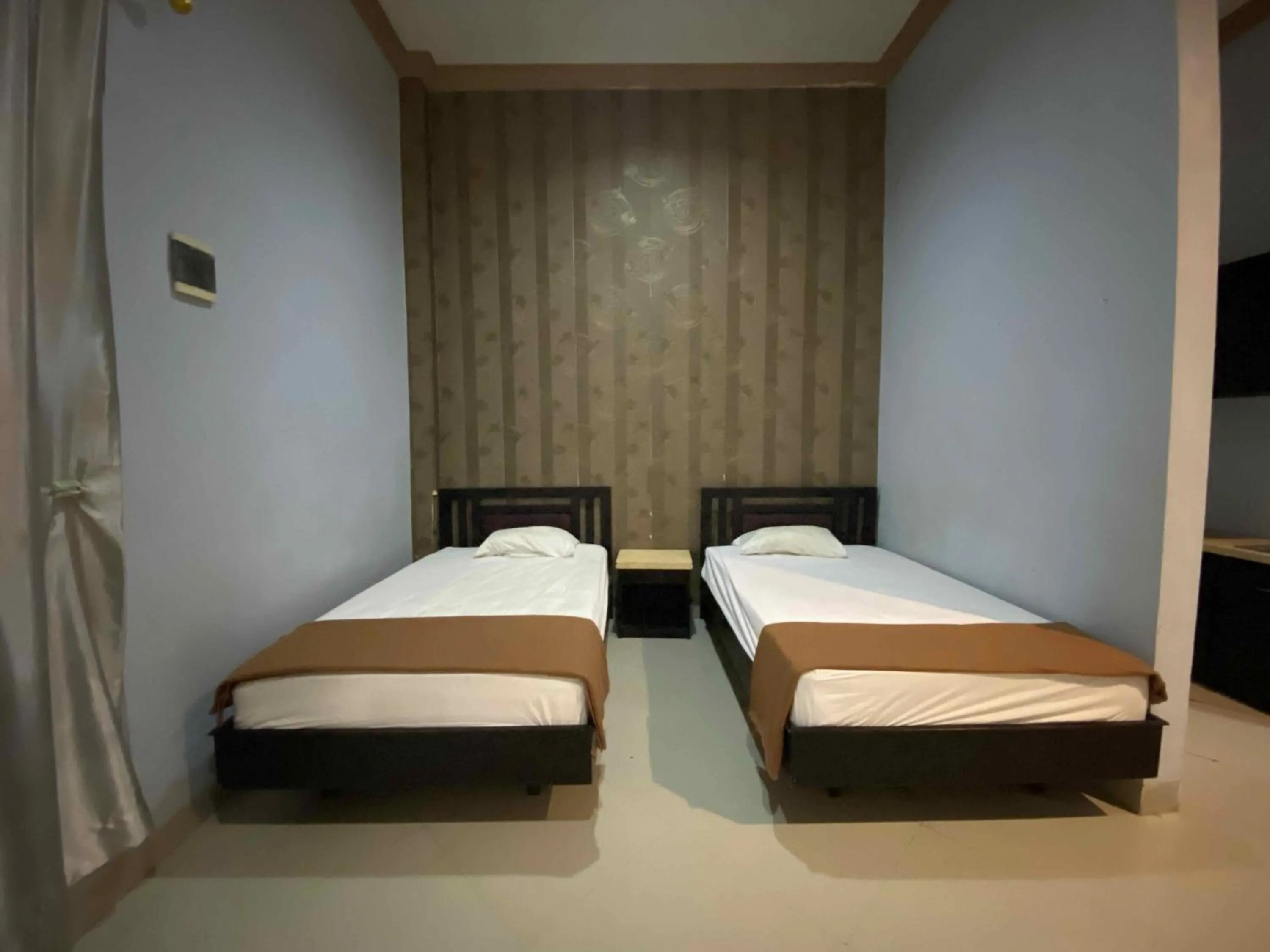Economy Twin Room in Hotel O near Universitas Palangka Raya formerly Wisma Aries