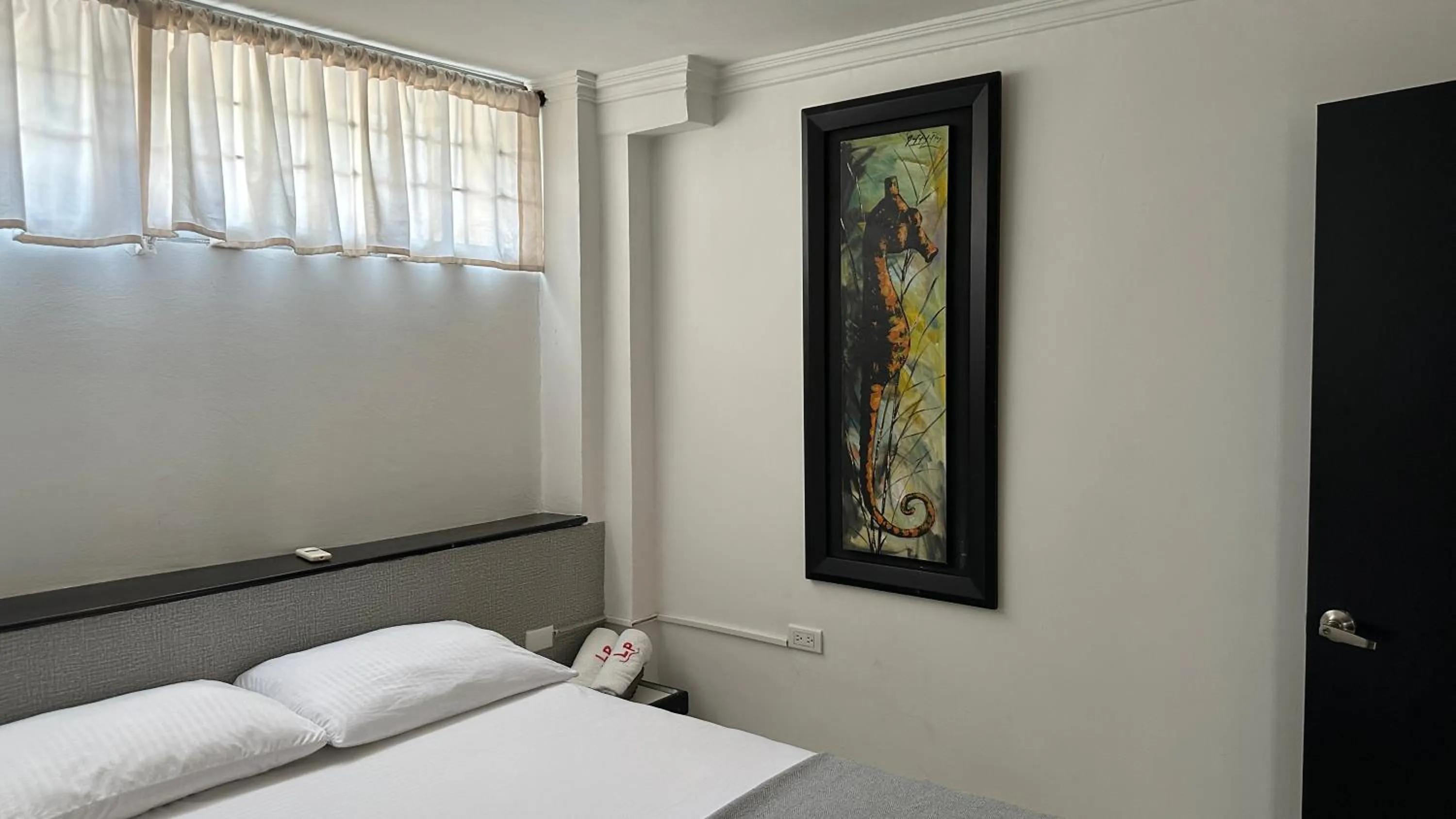 Bed in Las Piloneras Apartahotel