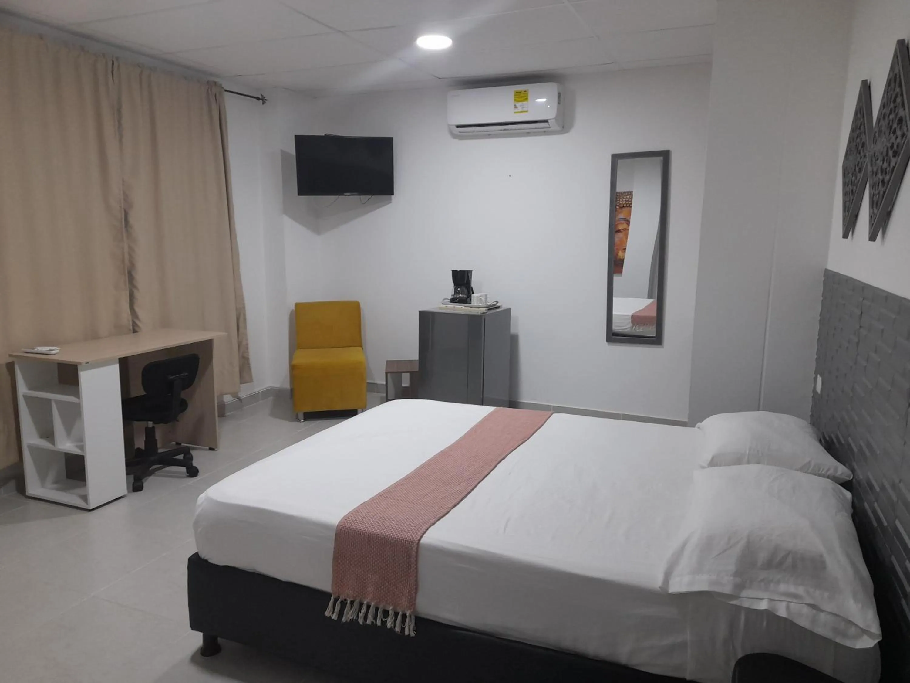 Bed in Las Piloneras Apartahotel