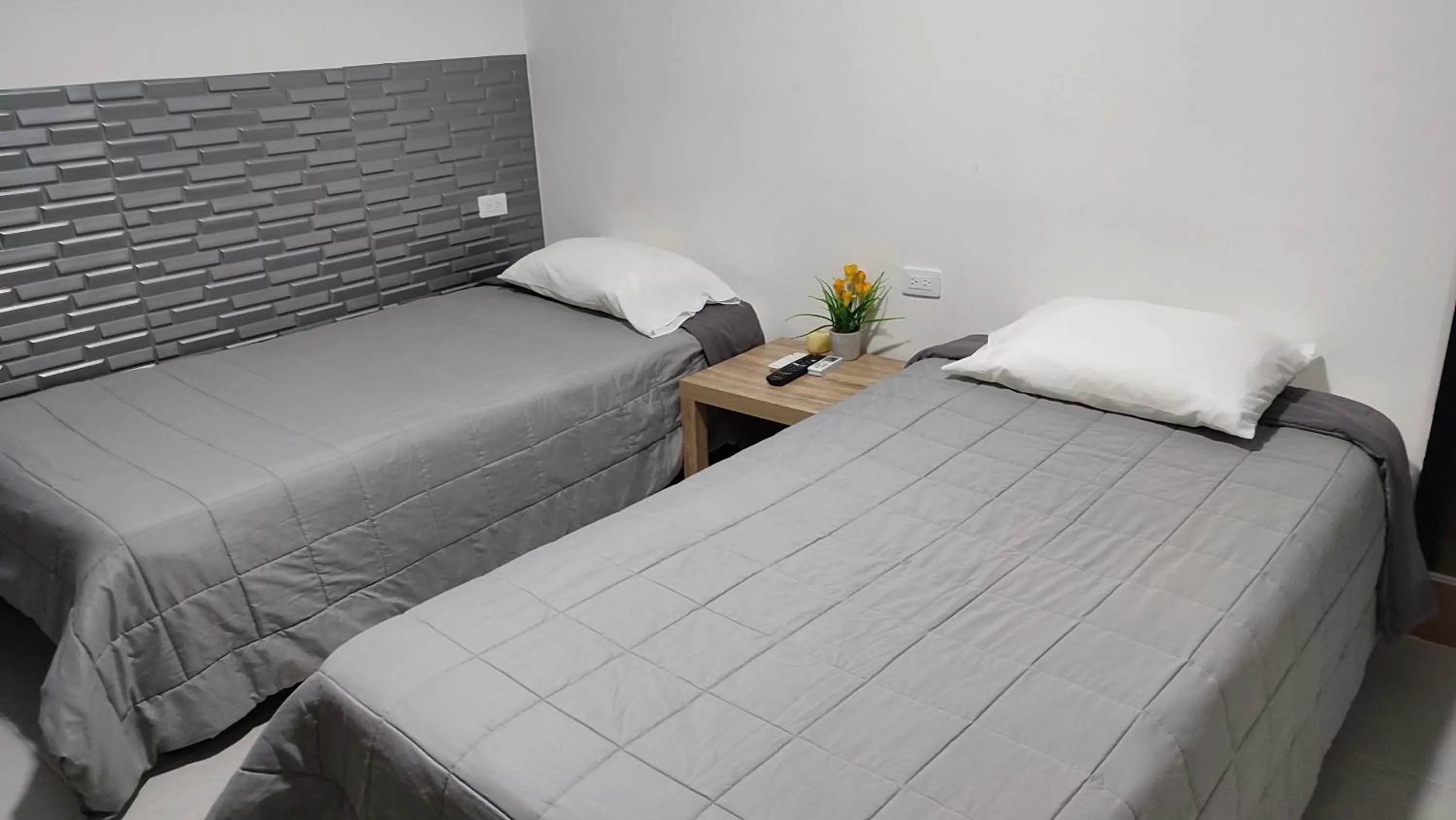 Bed in Las Piloneras Apartahotel