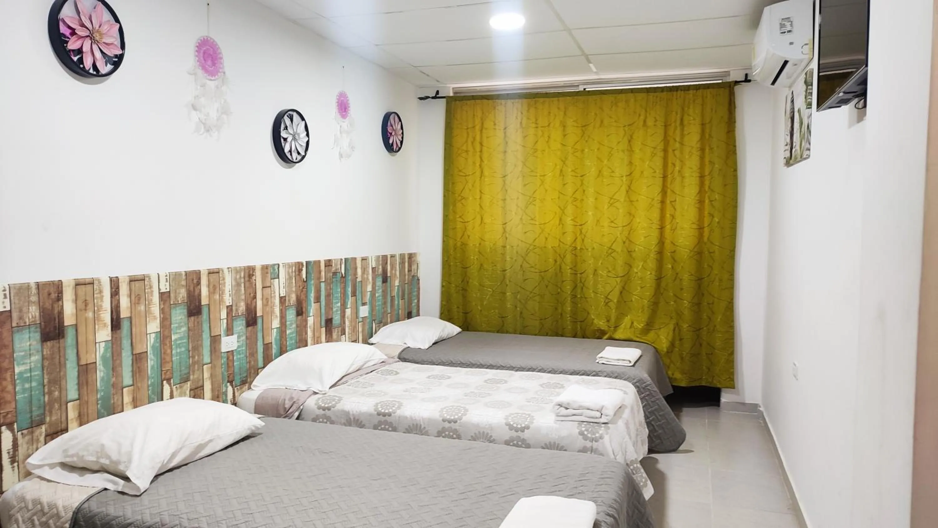 Bed in Las Piloneras Apartahotel