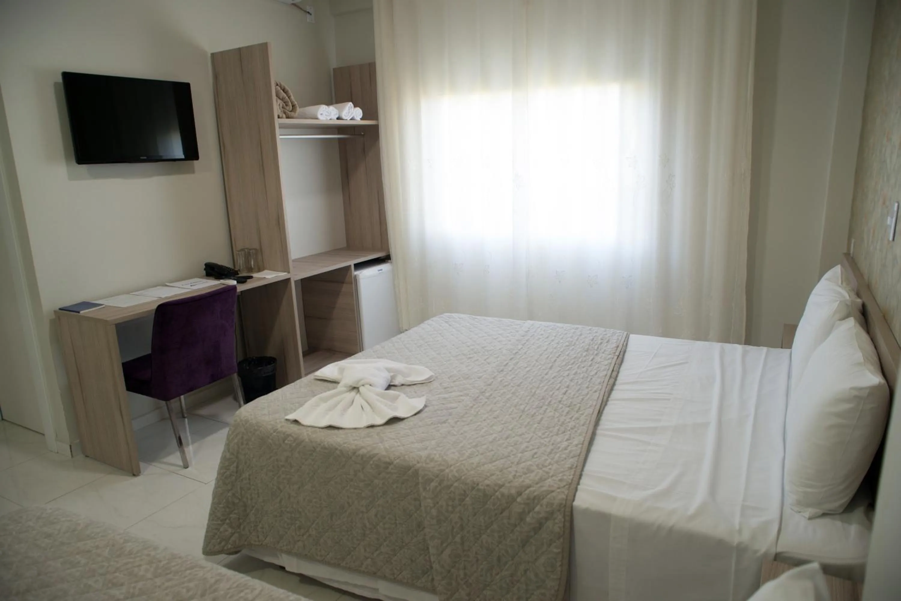 Bed in AJ Hotel Chapecó - Fácil Acesso Pátio Shopping e Rótula da Bandeira