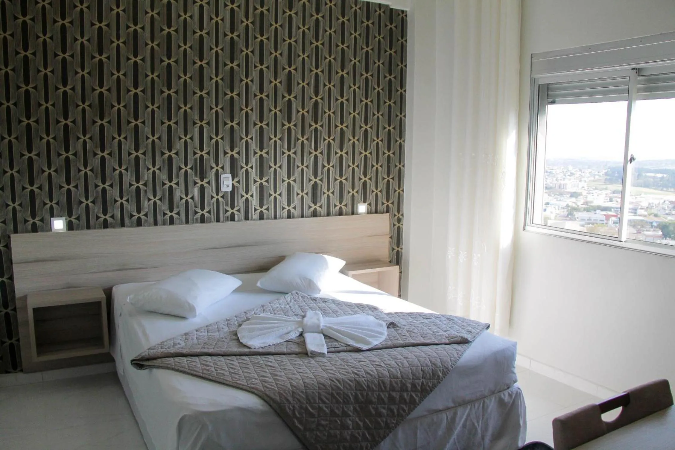 Bed in AJ Hotel Chapecó - Fácil Acesso Pátio Shopping e Rótula da Bandeira