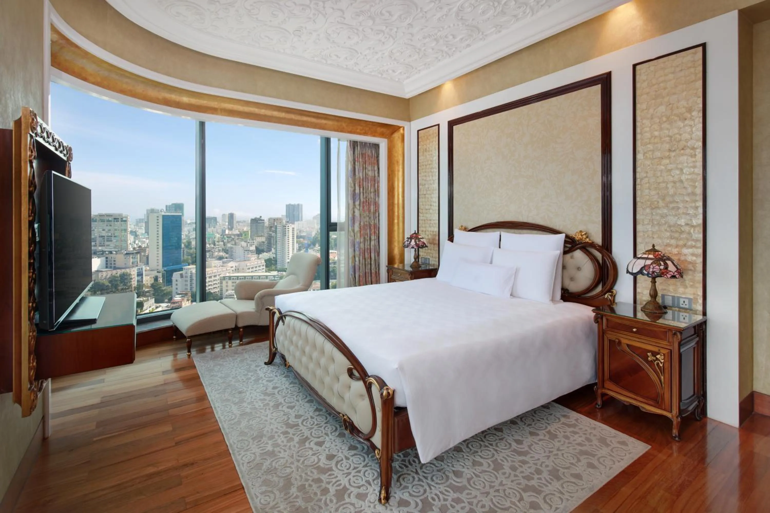 Bed in The Reverie Saigon Residential Suites