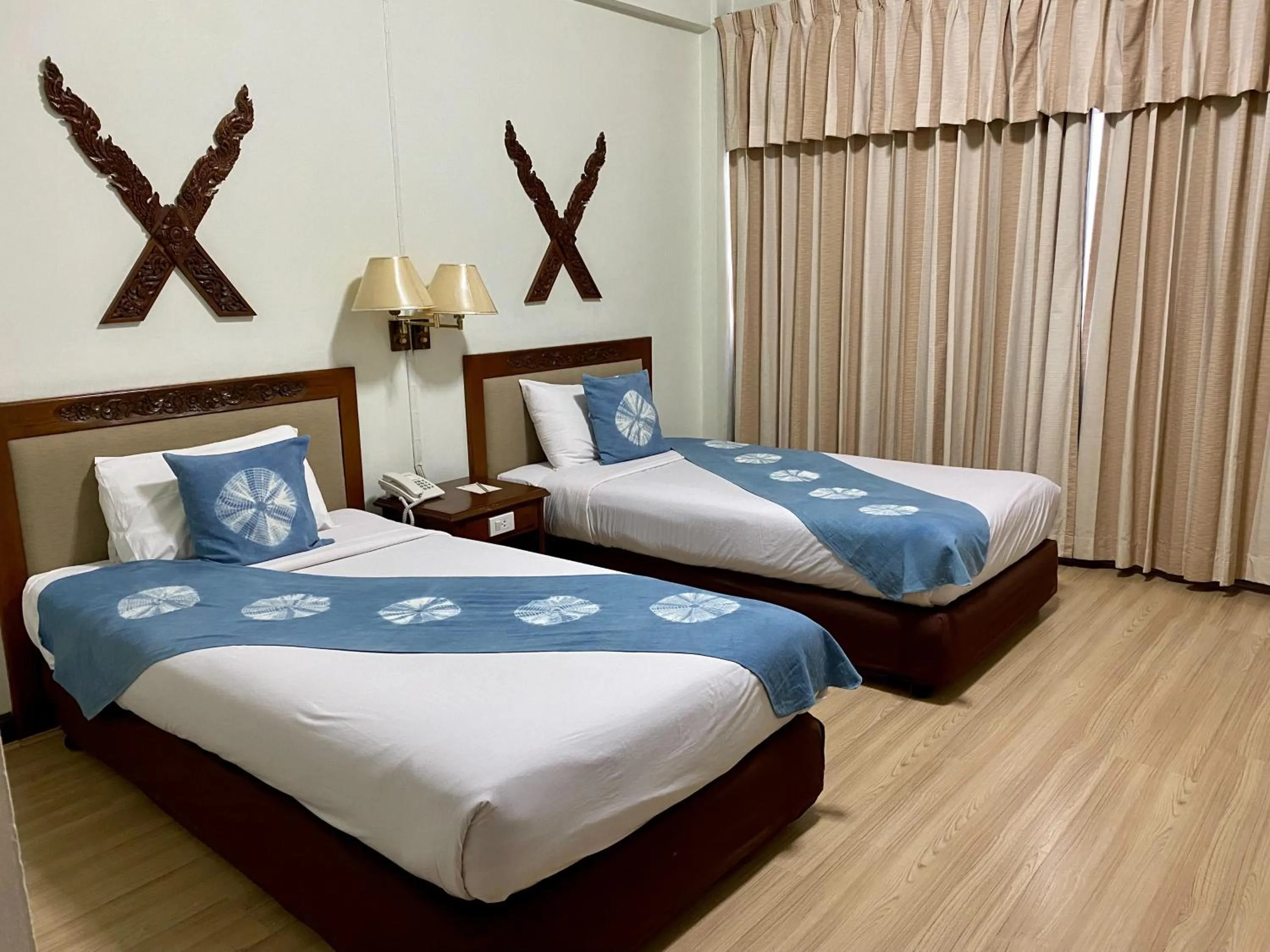 Bed in Maeyom Palace Hotel