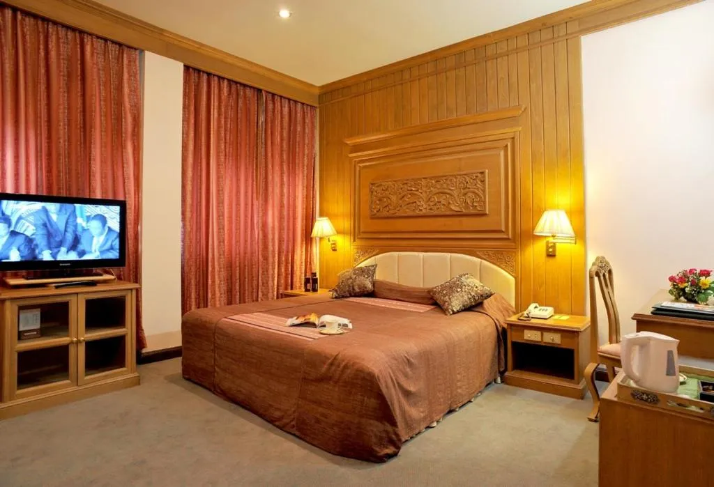 Bed in Maeyom Palace Hotel