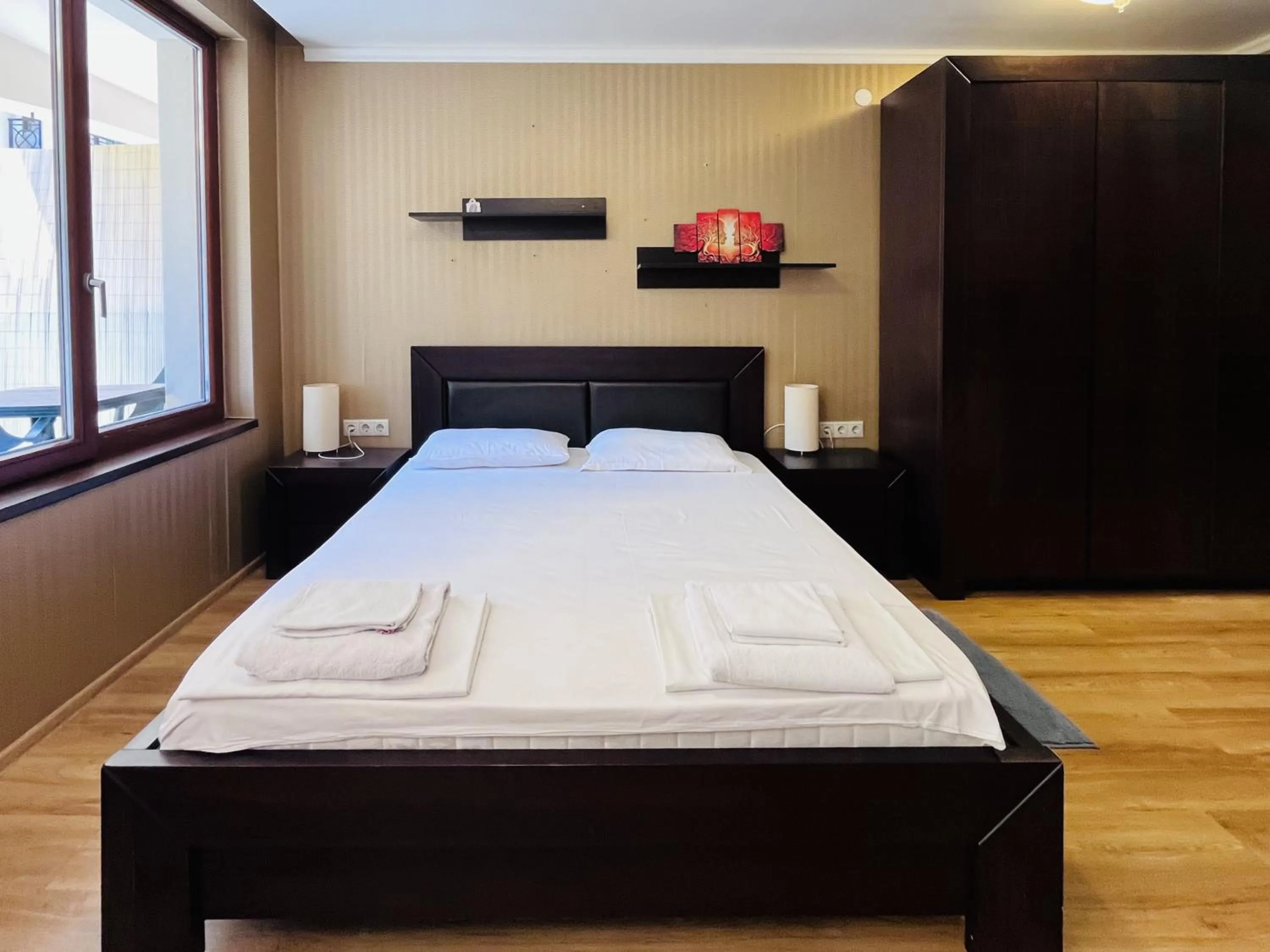 Bed in Sea View Rental Iglika Apartments