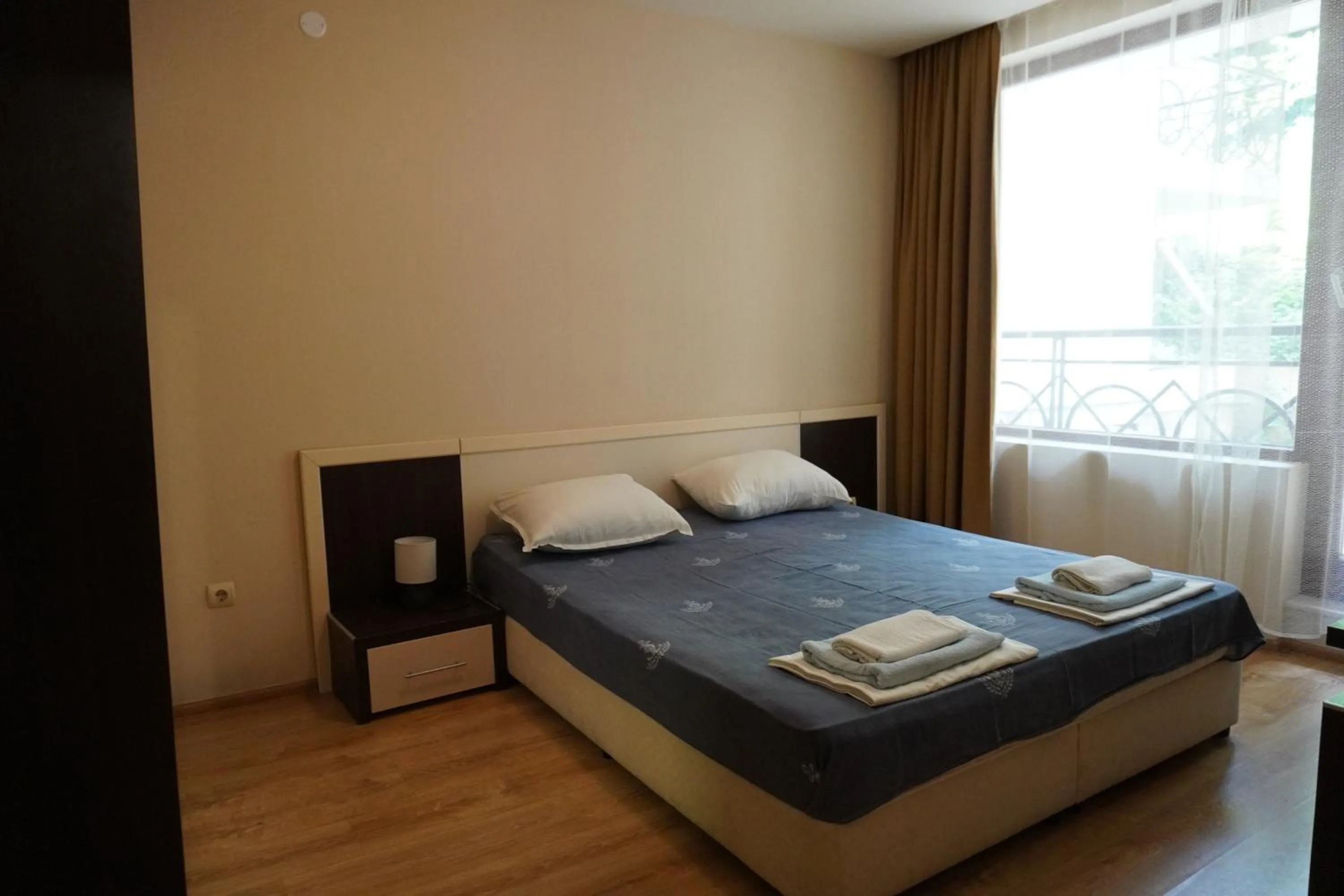 Bed in Sea View Rental Iglika Apartments