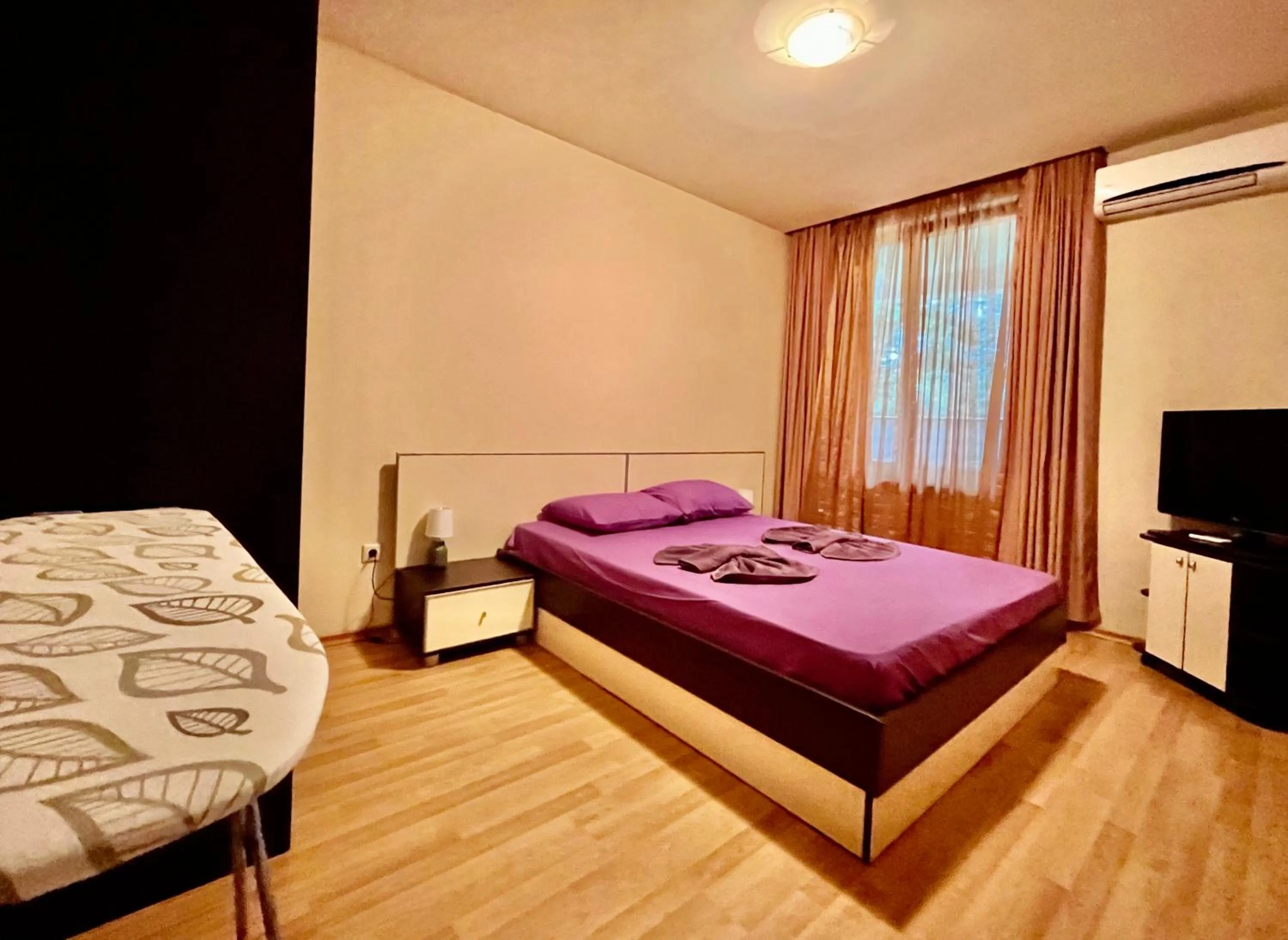 Bed in Sea View Rental Iglika Apartments