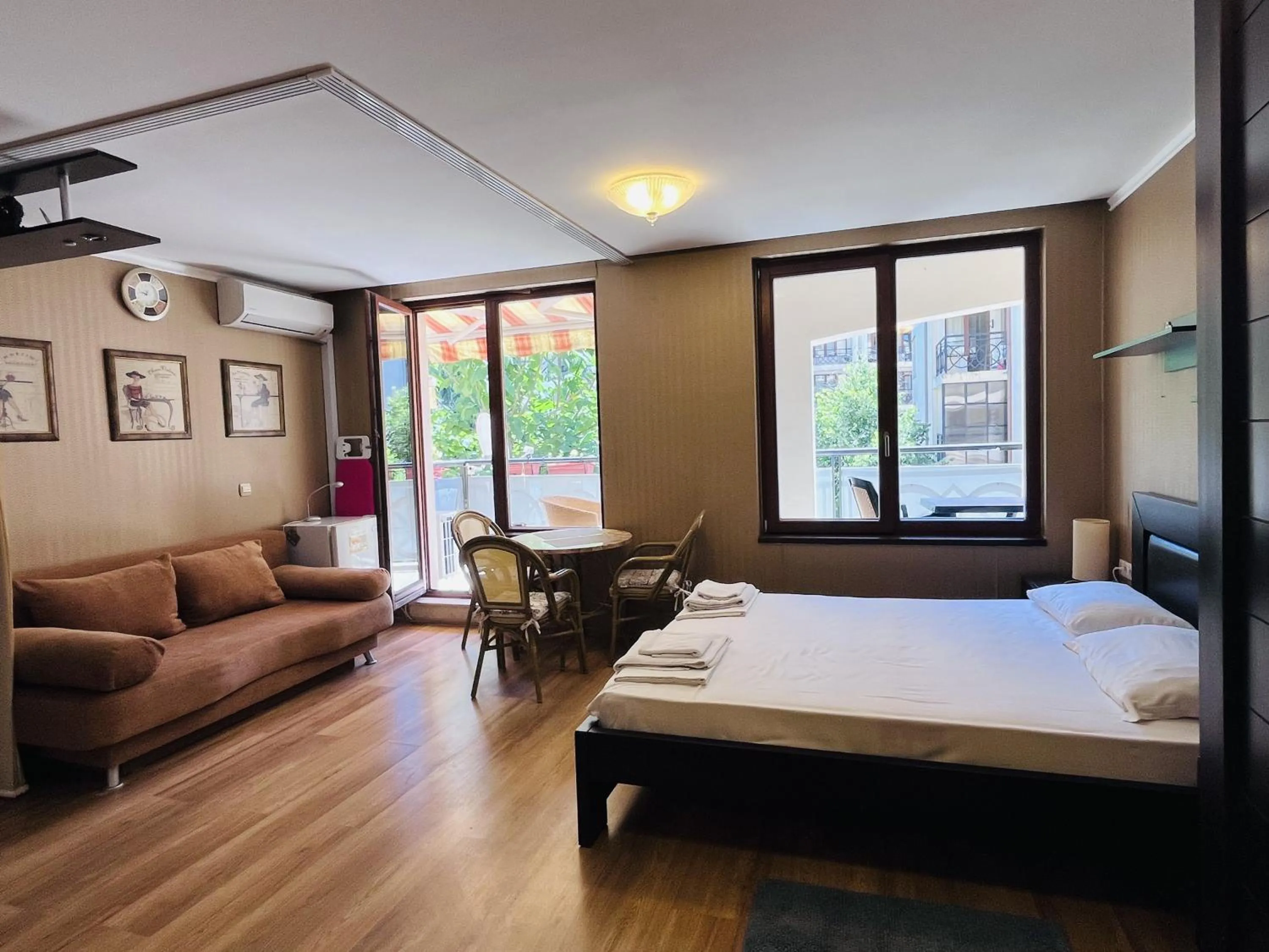 Bed in Sea View Rental Iglika Apartments