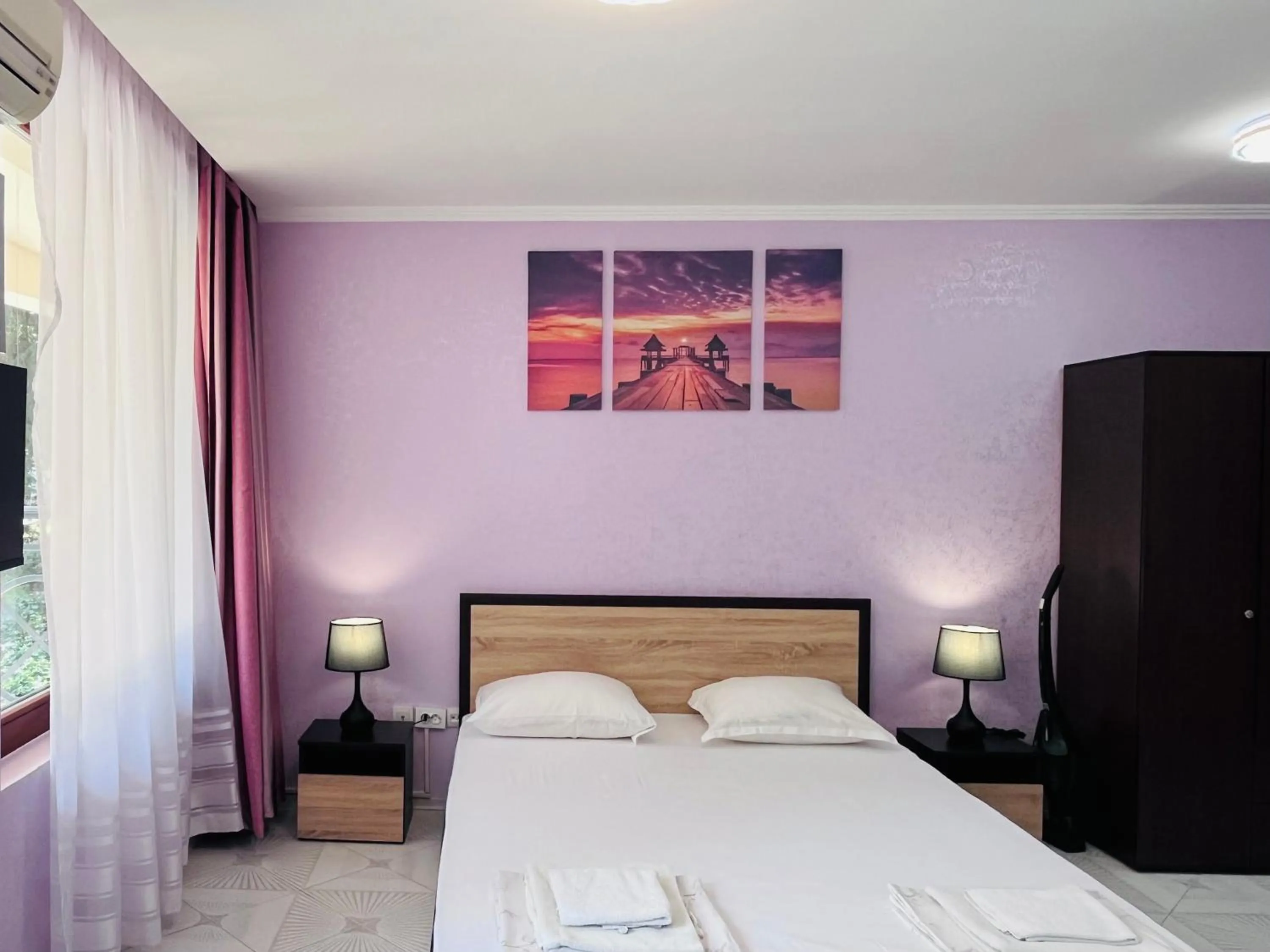 Bed in Sea View Rental Iglika Apartments