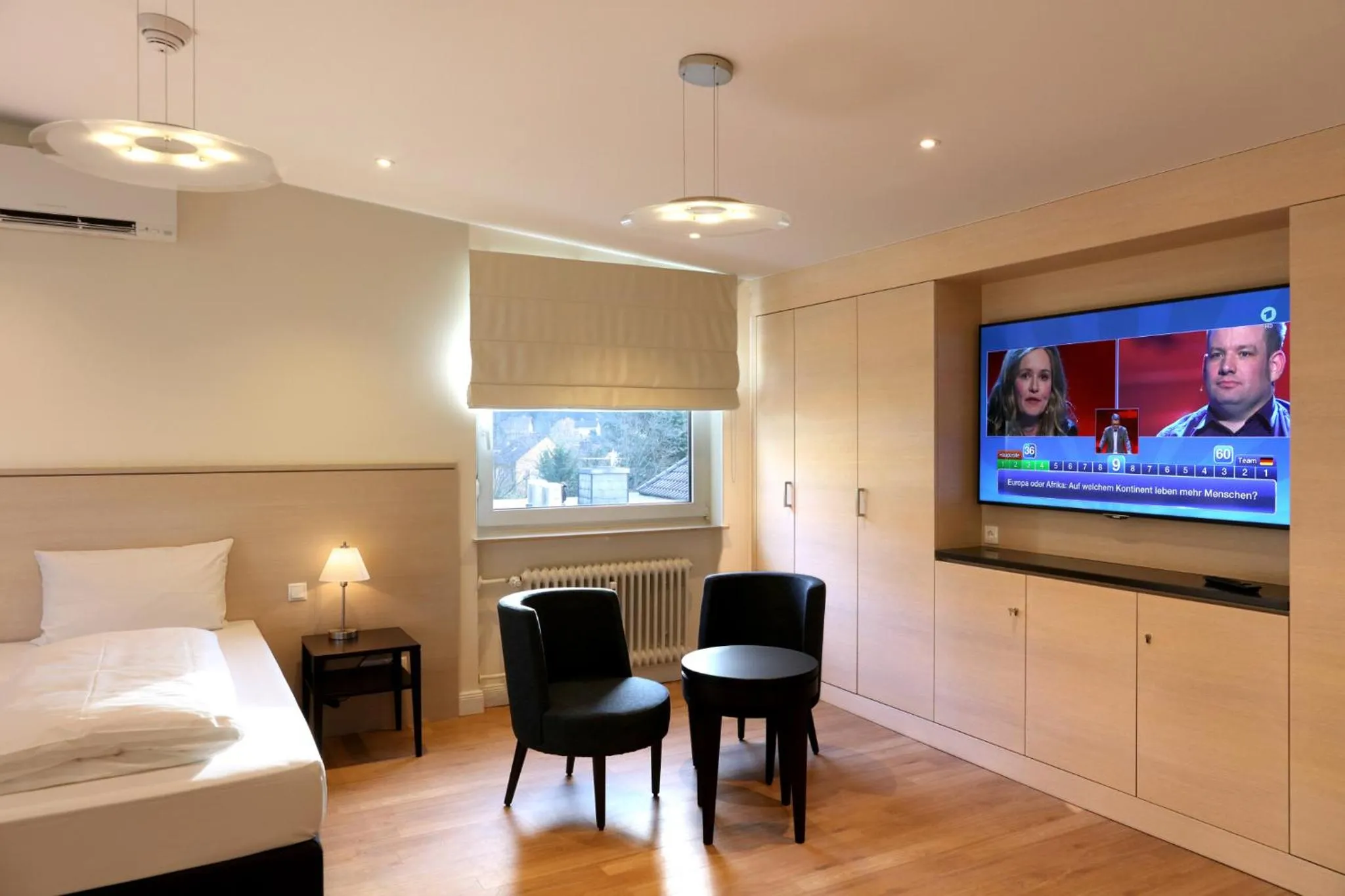 Seating area, Bed in Villa Waldfrieden - Design trifft Budget