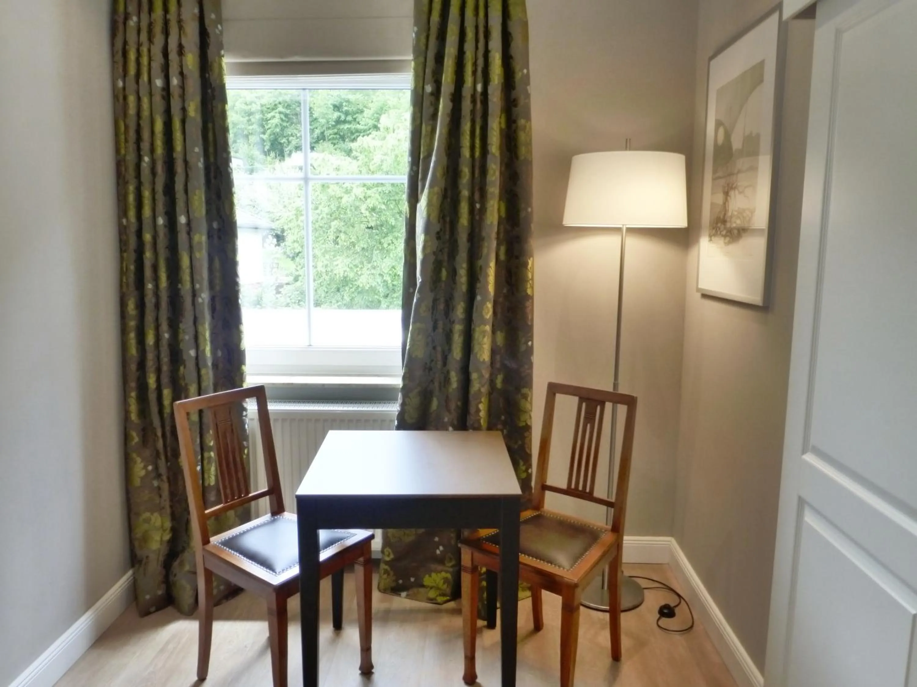 Seating area in Villa Waldfrieden - Design trifft Budget