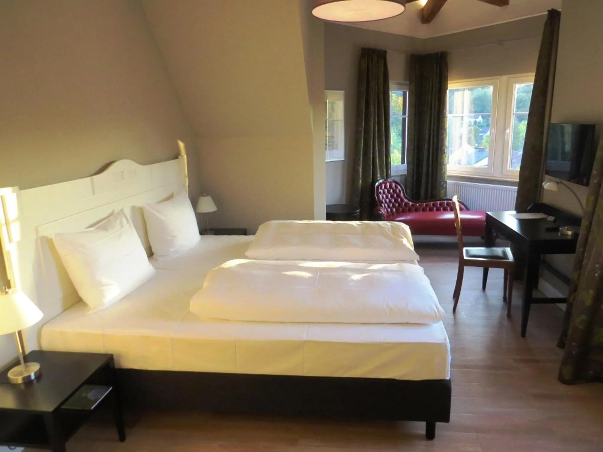 Photo of the whole room, Bed in Villa Waldfrieden - Design trifft Budget