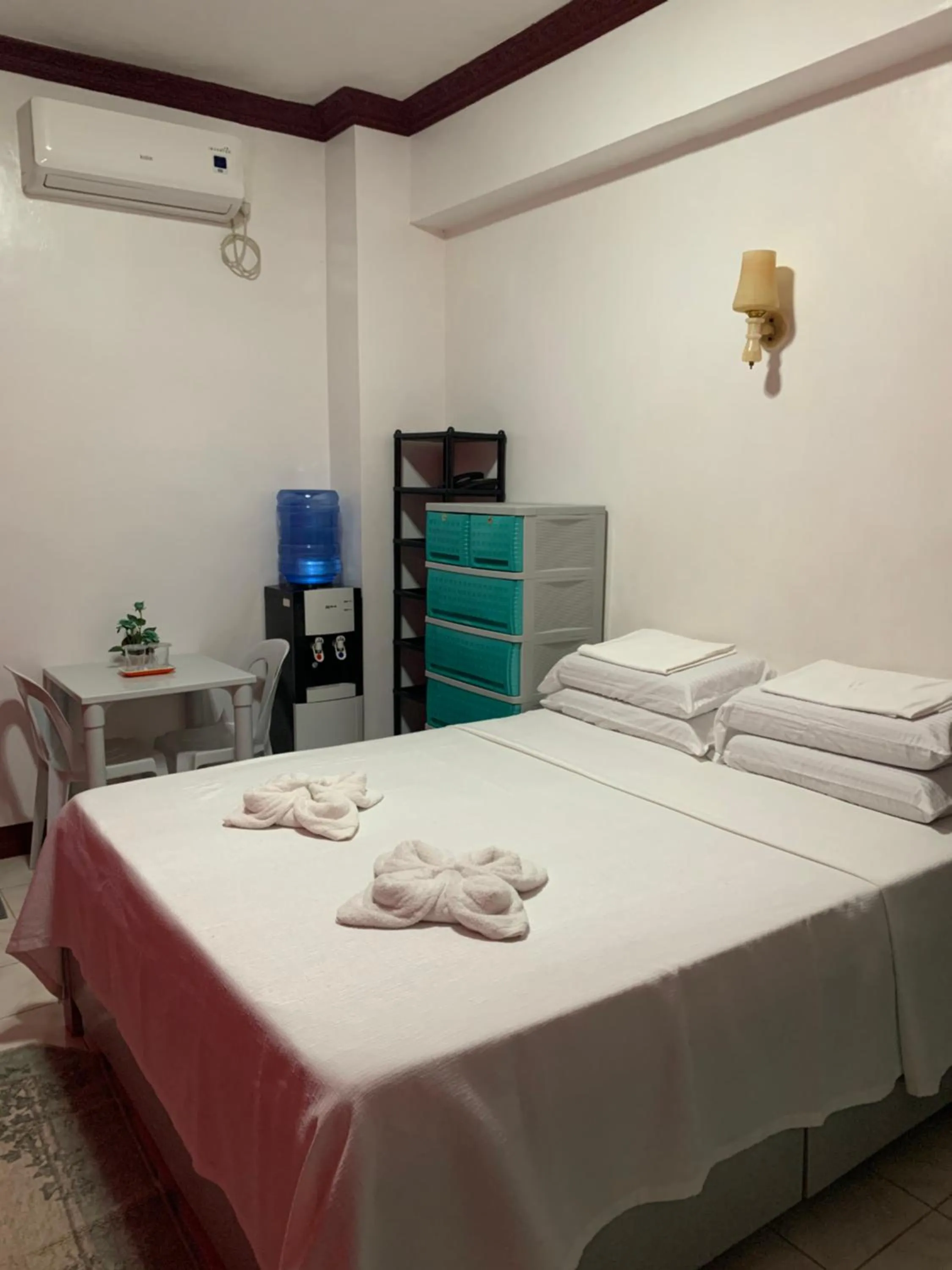 Bed in First Baby Bytes Guest House