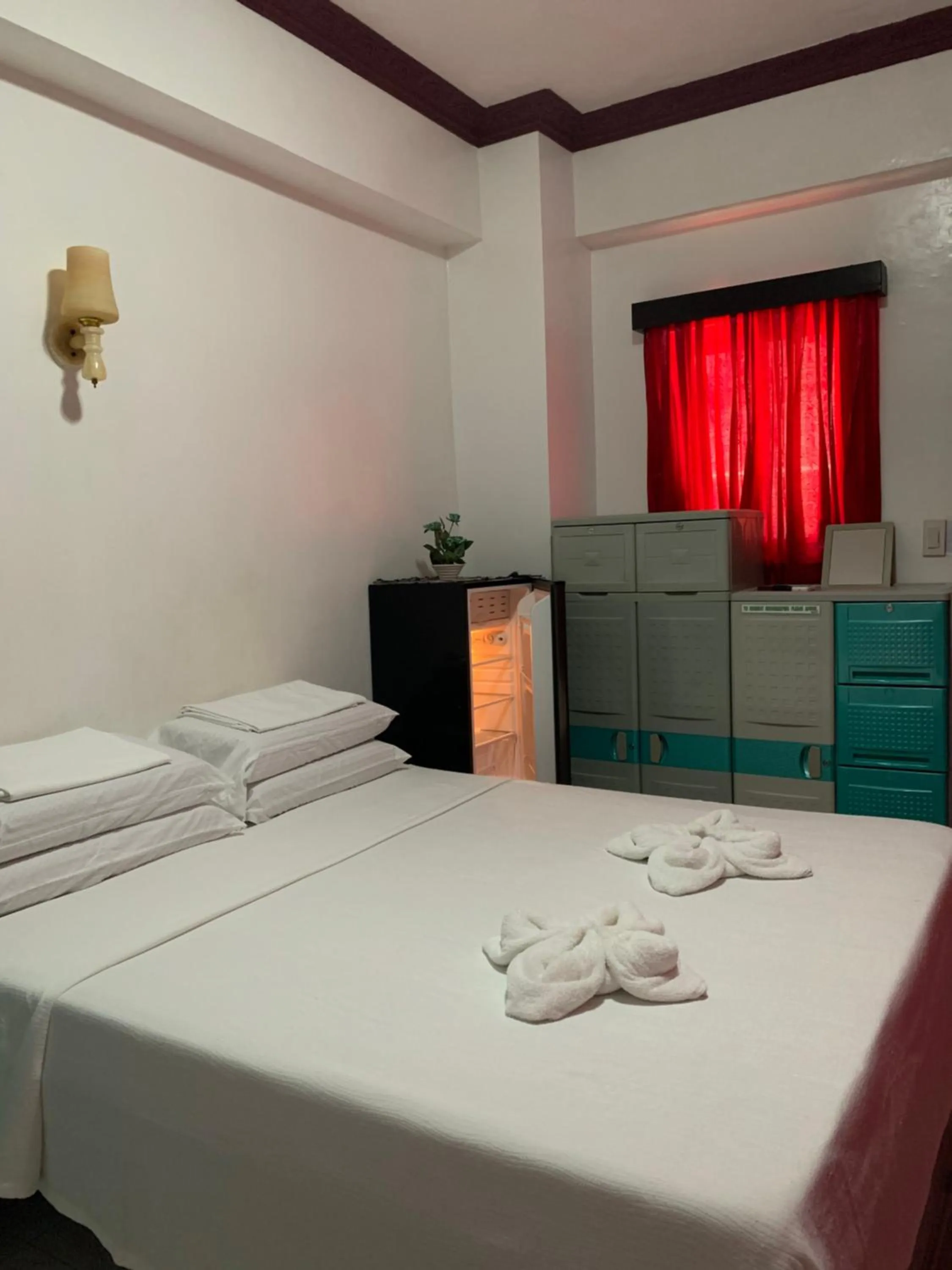 Bed in First Baby Bytes Guest House