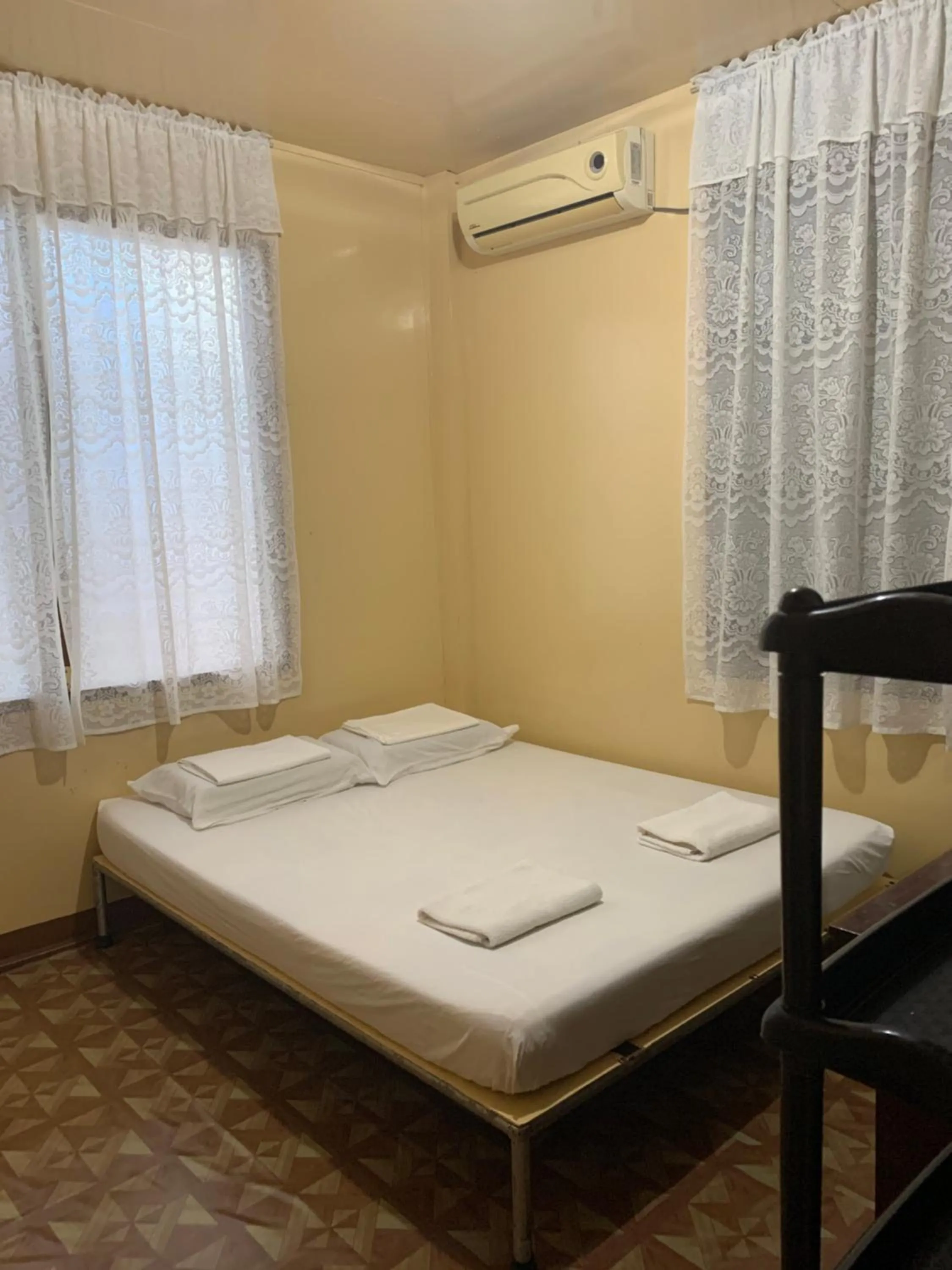 Bed in First Baby Bytes Guest House