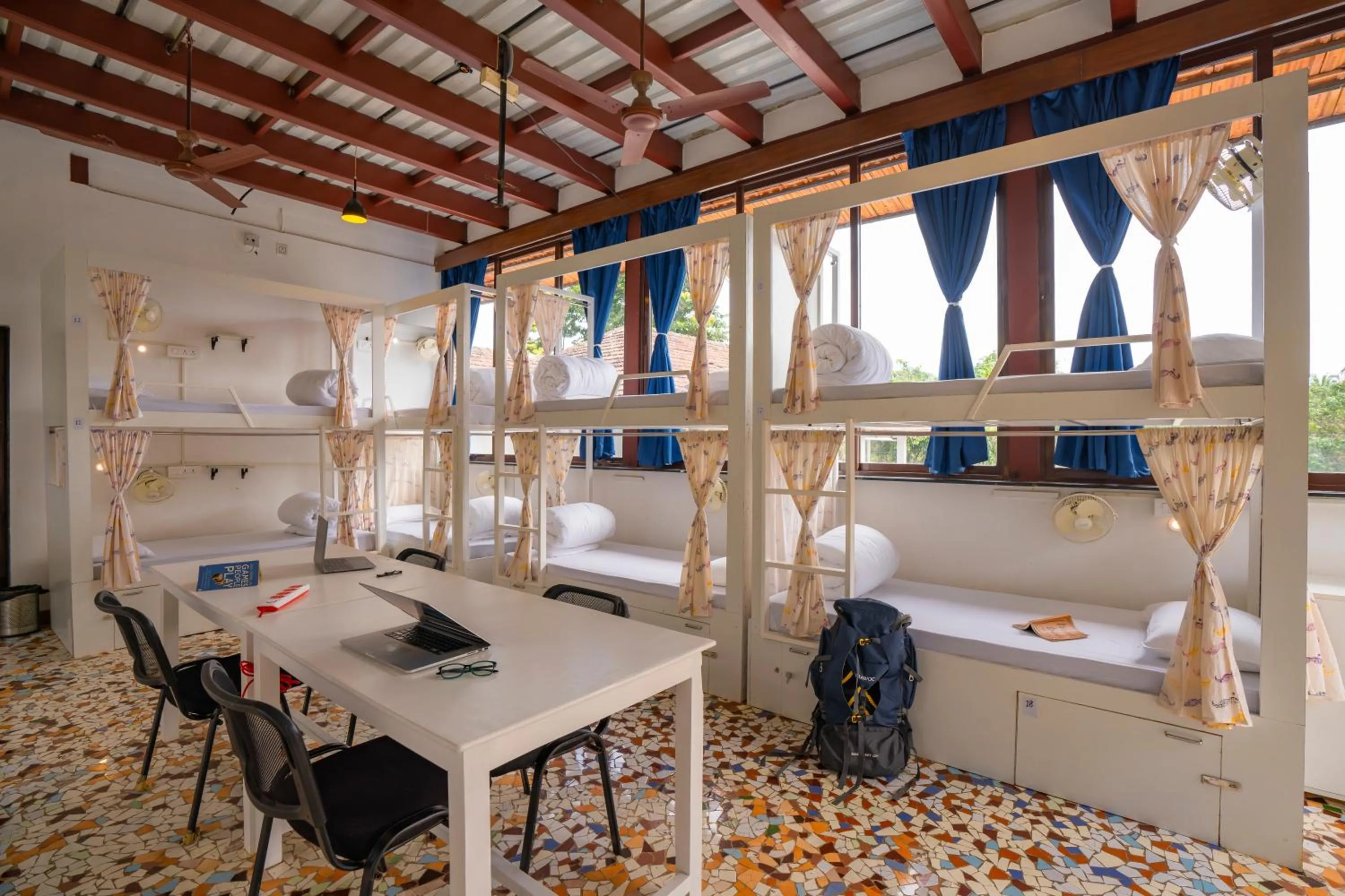 Seating area in Moustache Goa Luxuria