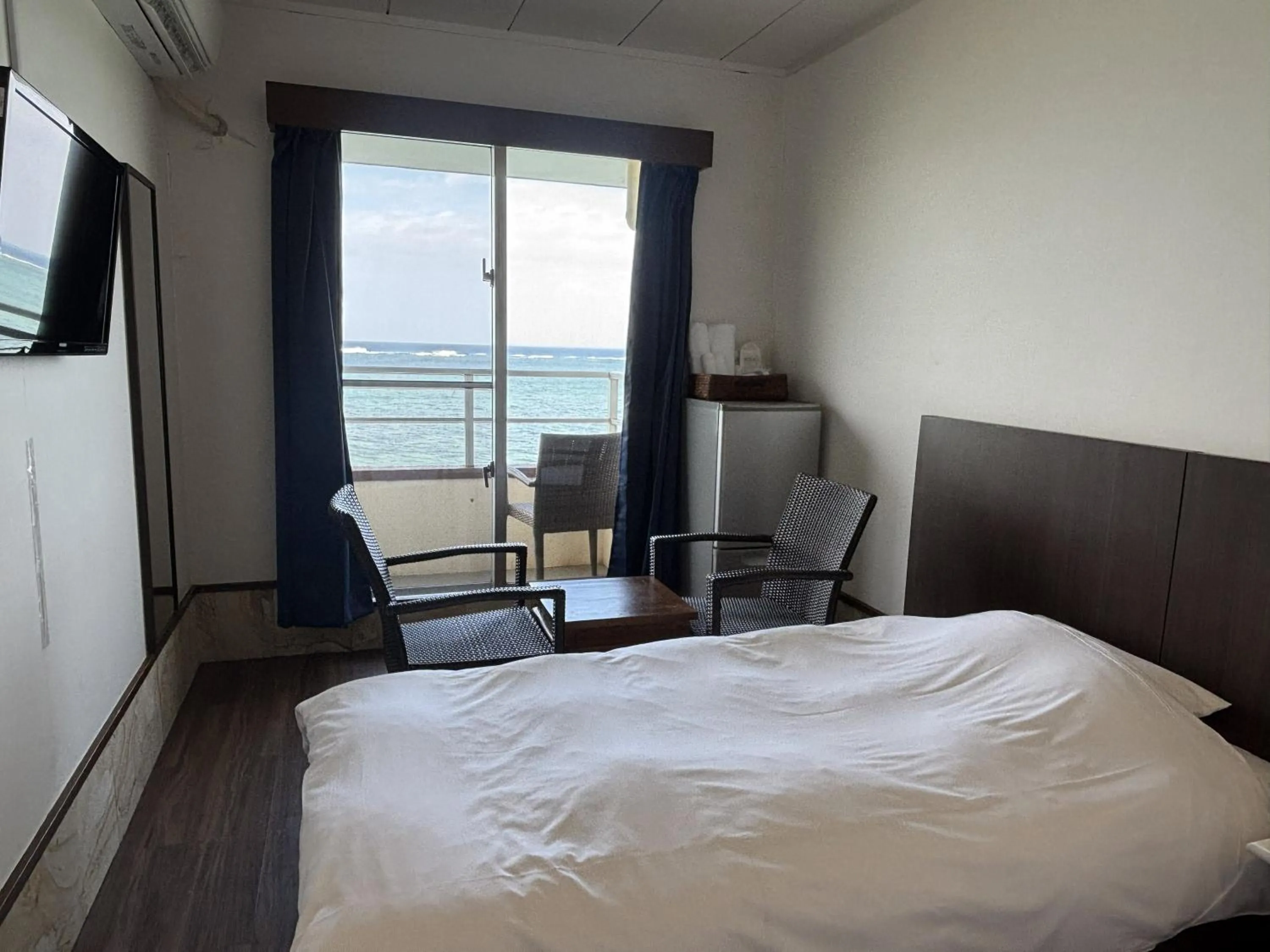 Photo of the whole room, Bed in Hotel Oceans Nakijin
