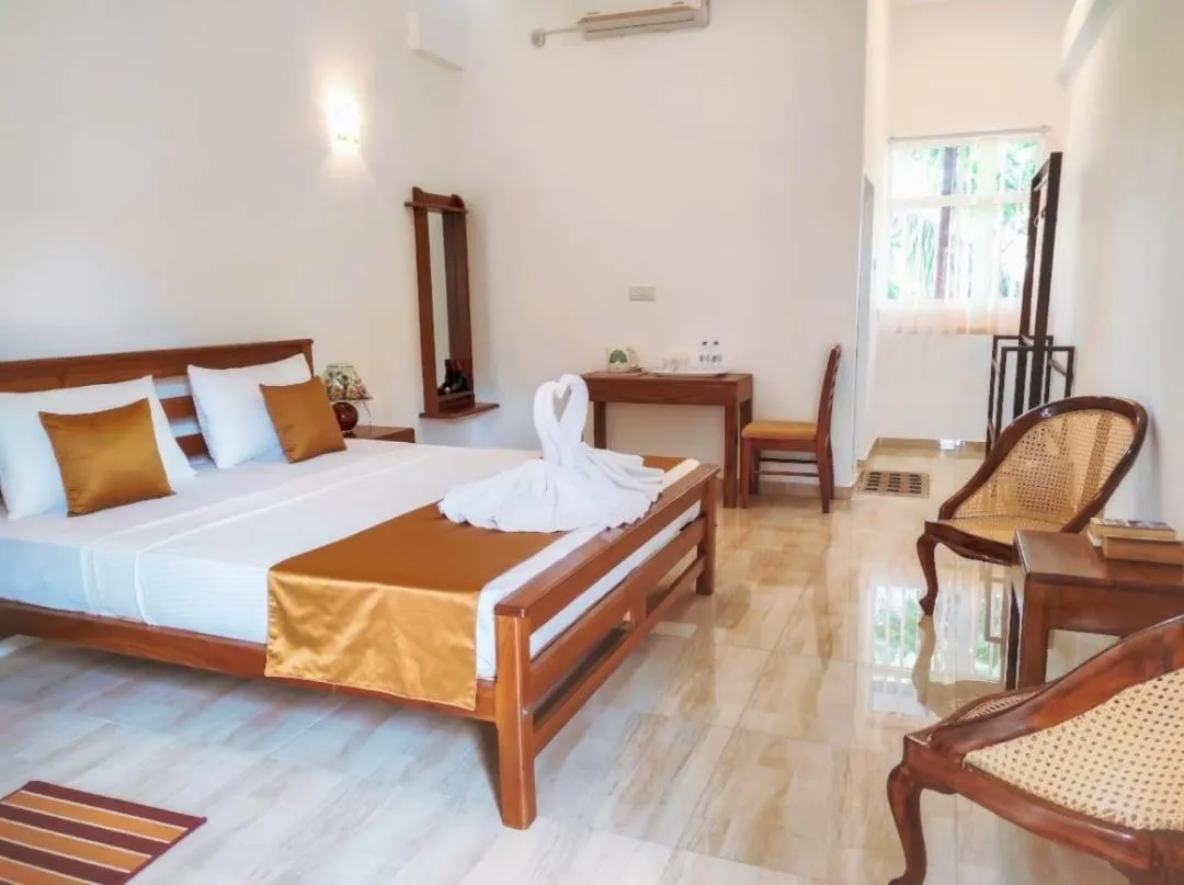 Bed in Hotel Nilketha Yala Tissamaharama