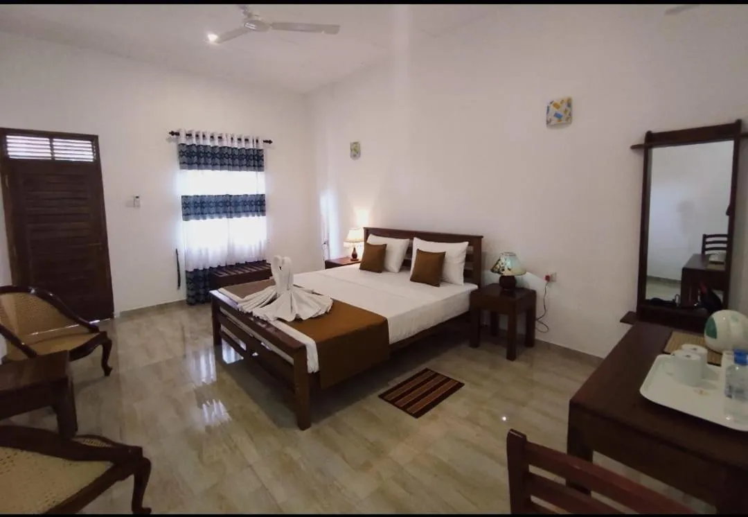 Bed in Hotel Nilketha Yala Tissamaharama
