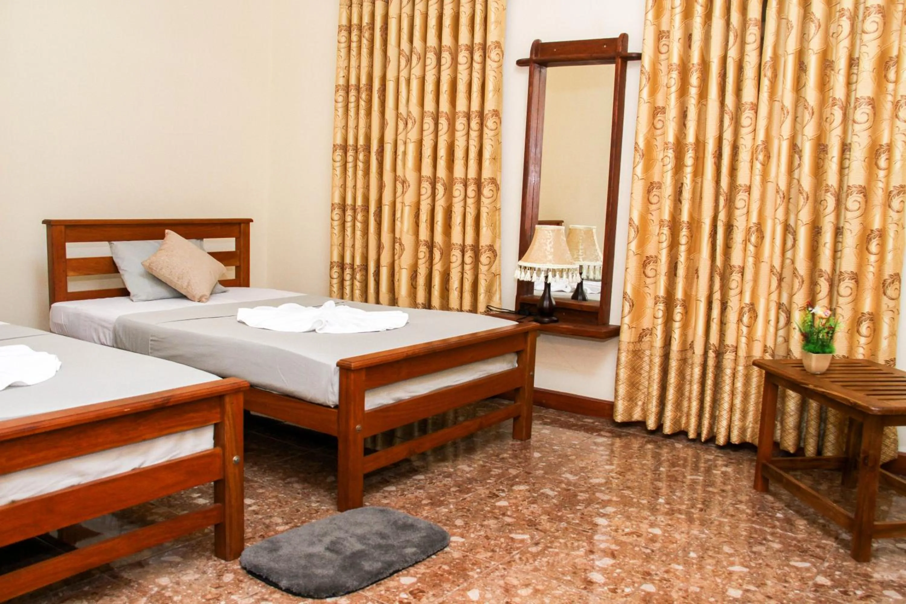 Photo of the whole room, Bed in Hotel Nilketha Yala Tissamaharama
