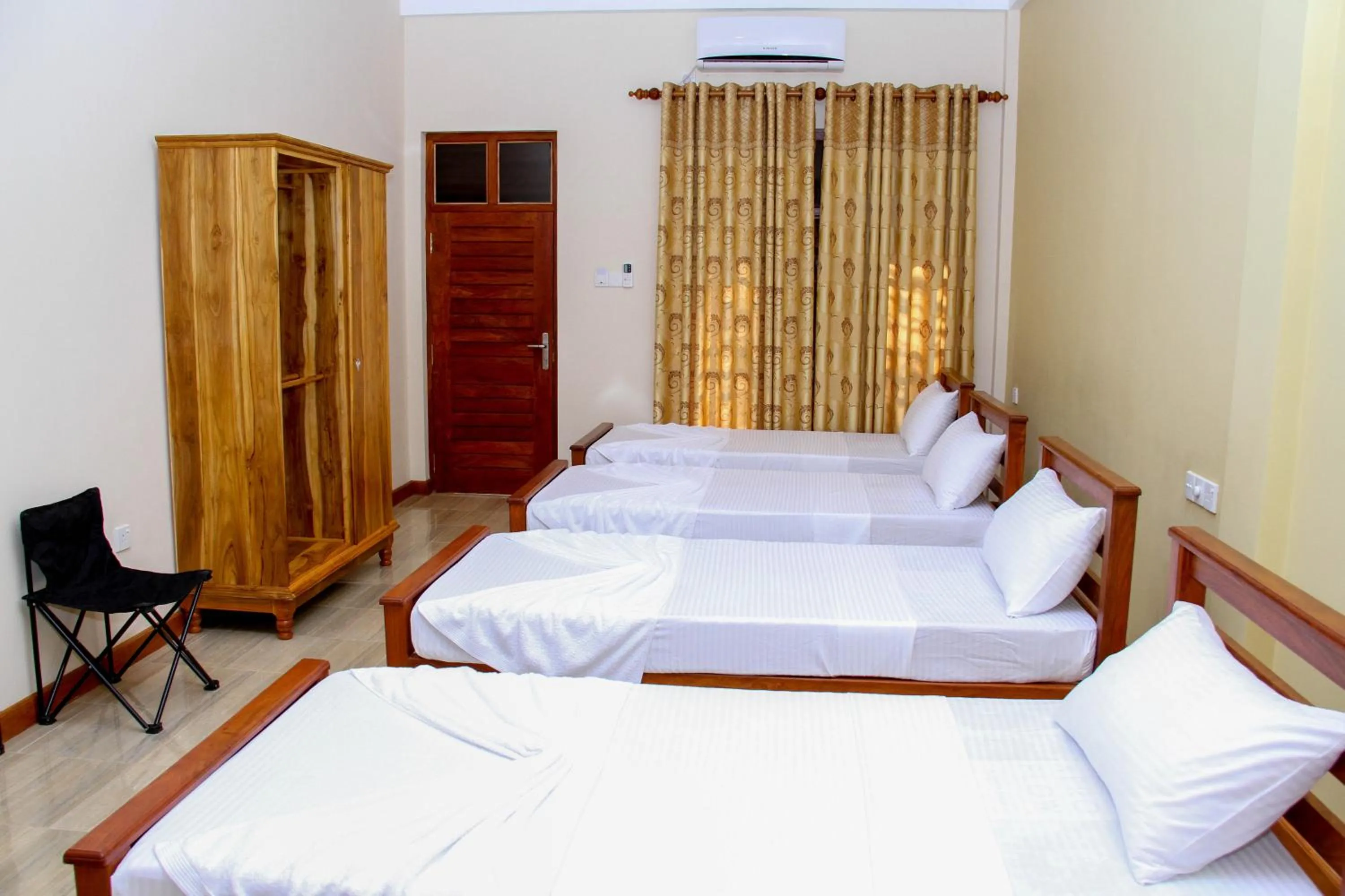 Photo of the whole room, Bed in Hotel Nilketha Yala Tissamaharama