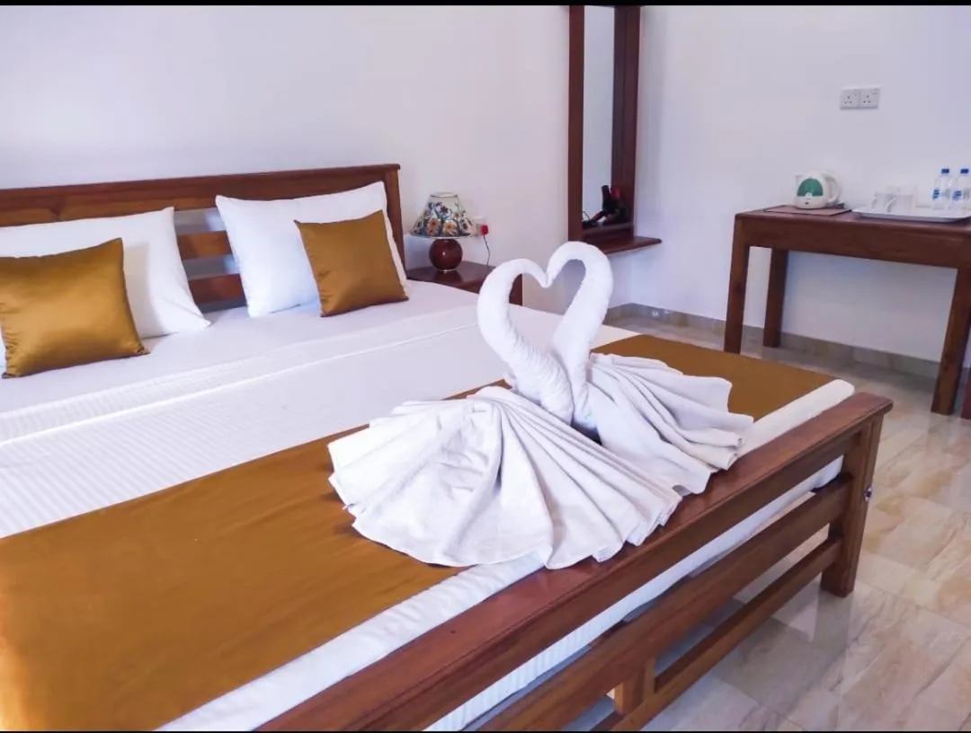 Bed in Hotel Nilketha Yala Tissamaharama