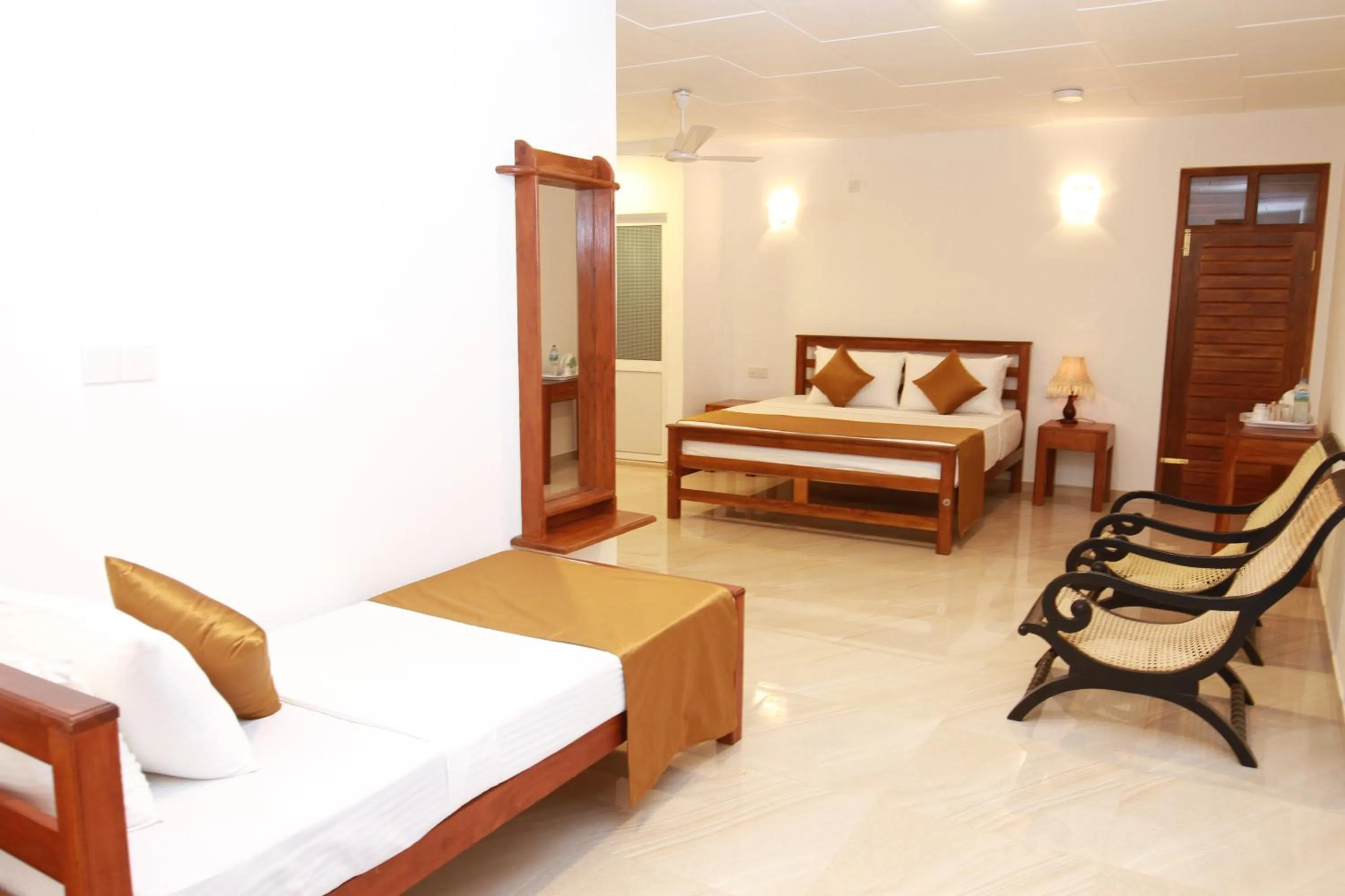 Bed in Hotel Nilketha Yala Tissamaharama