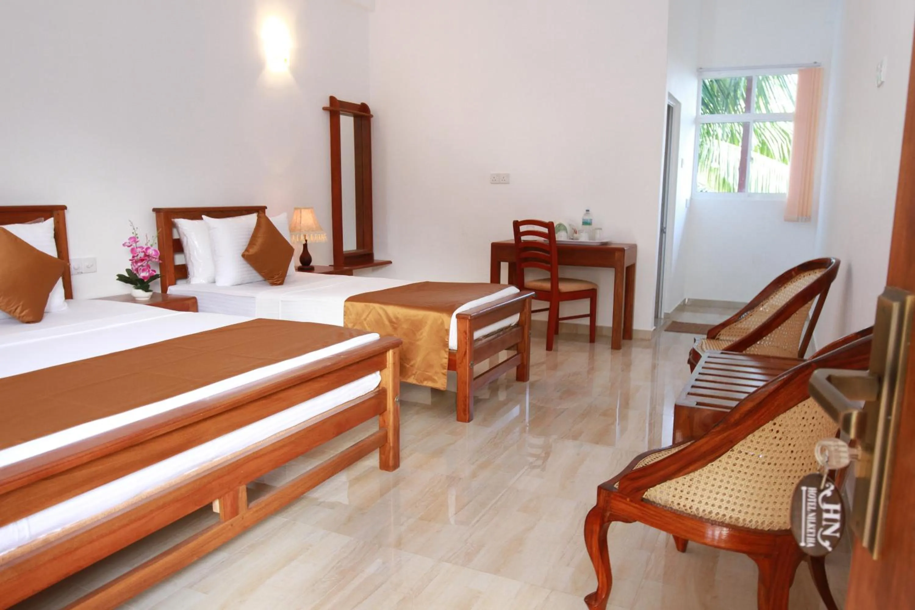 Bed in Hotel Nilketha Yala Tissamaharama