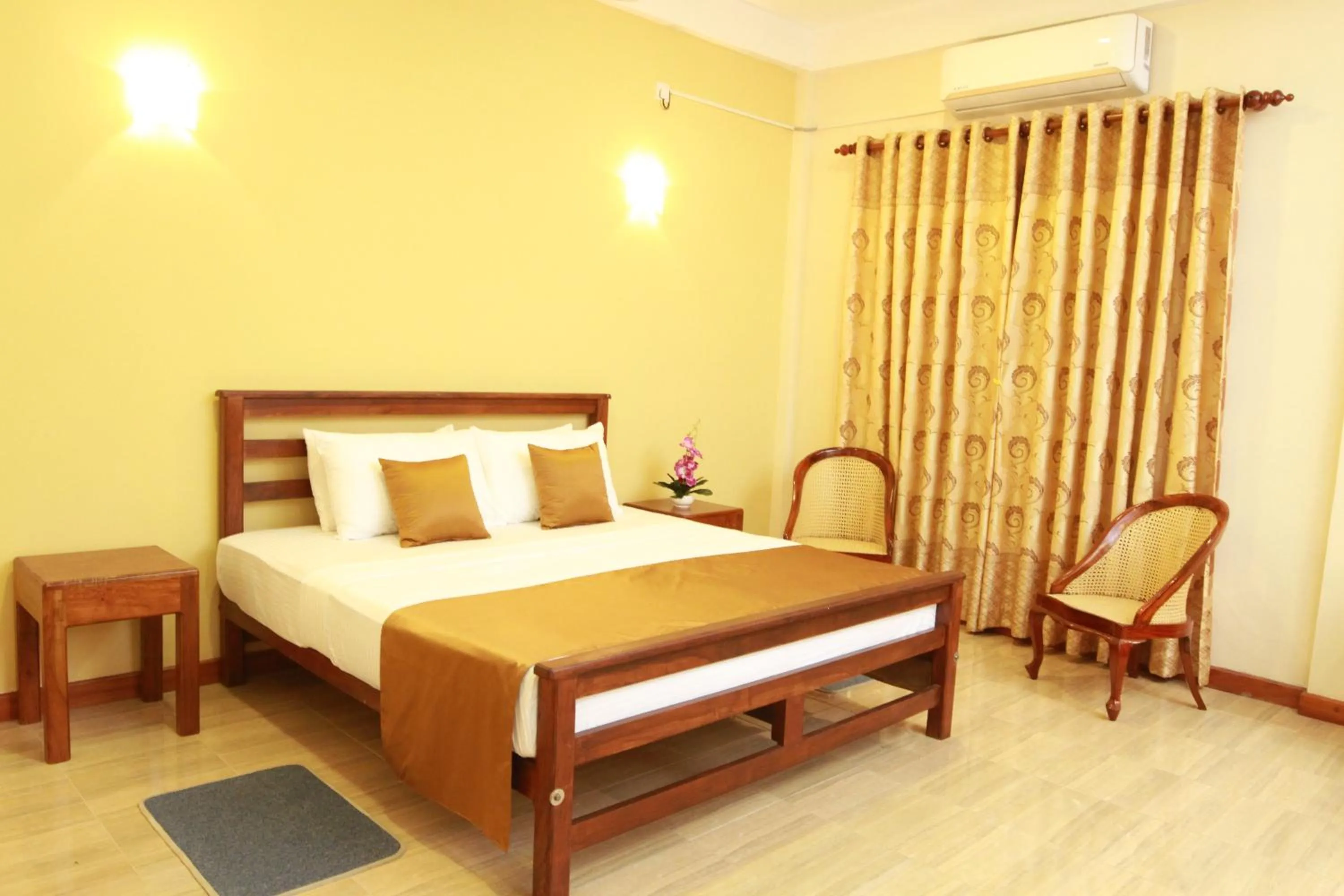 Bed in Hotel Nilketha Yala Tissamaharama