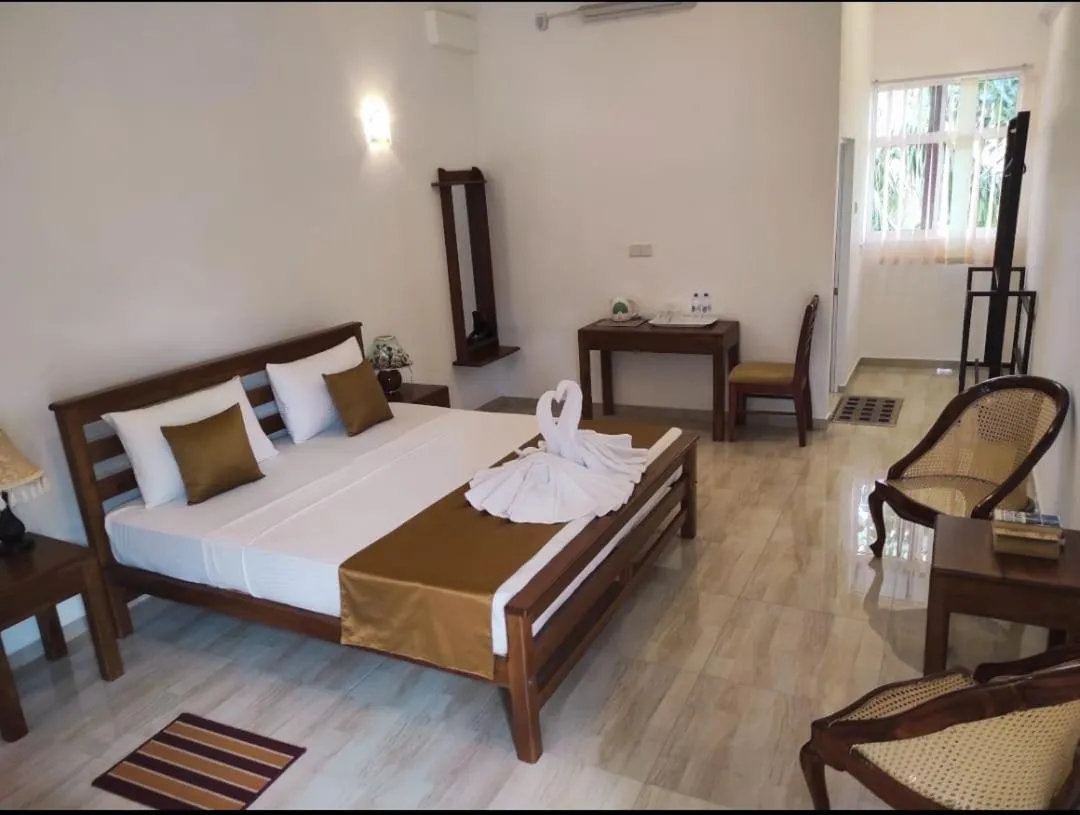 Bed in Hotel Nilketha Yala Tissamaharama