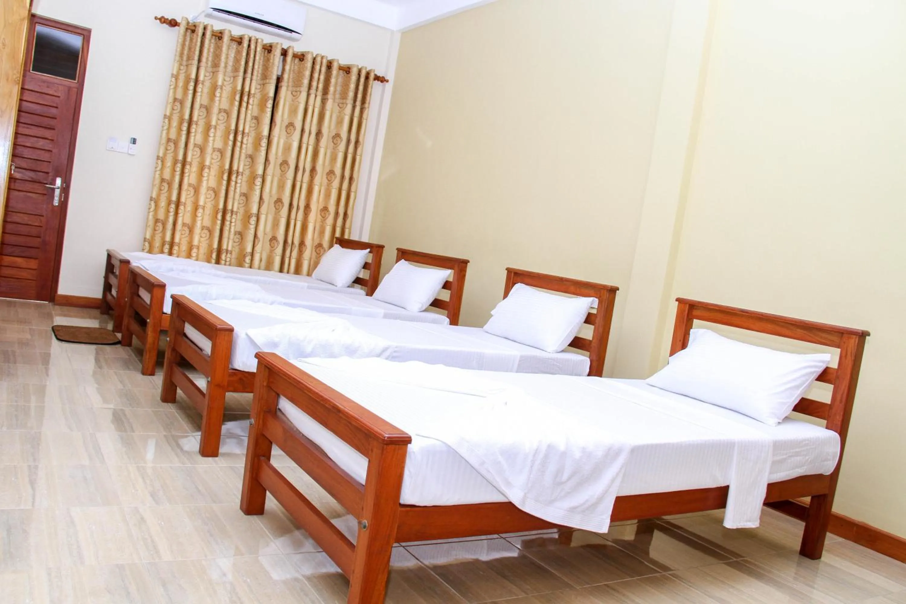 Photo of the whole room, Bed in Hotel Nilketha Yala Tissamaharama
