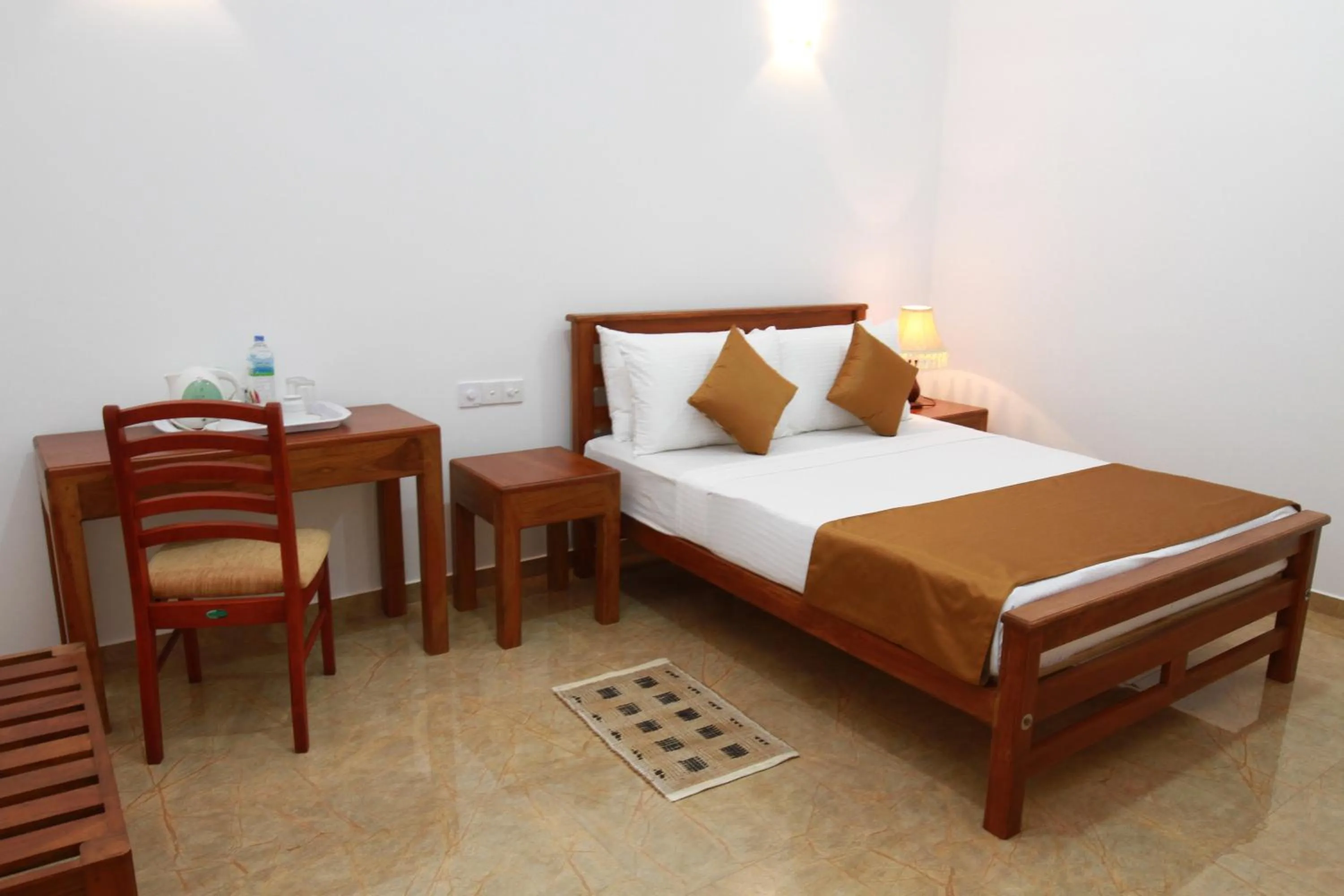 Bed in Hotel Nilketha Yala Tissamaharama