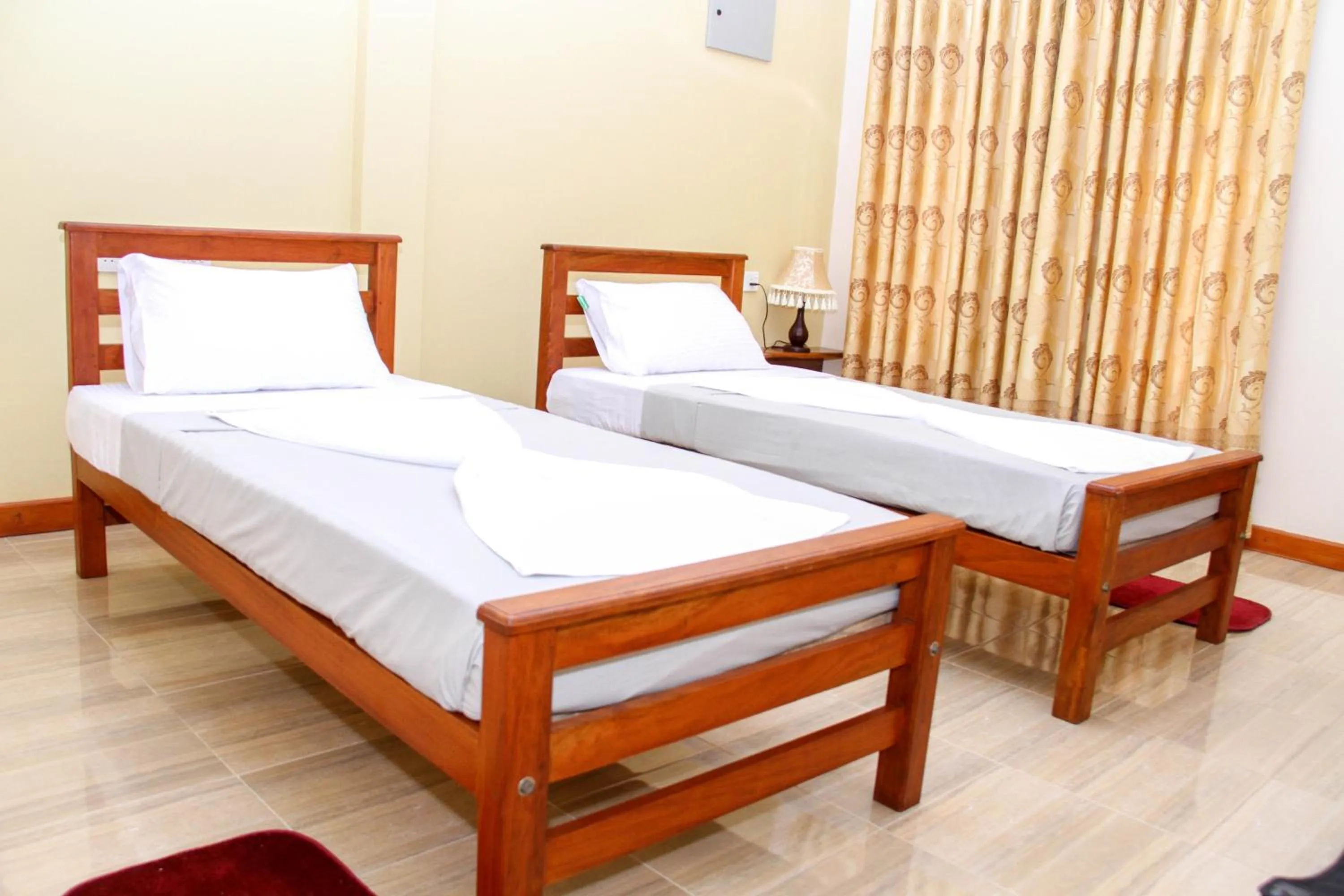 Photo of the whole room, Bed in Hotel Nilketha Yala Tissamaharama