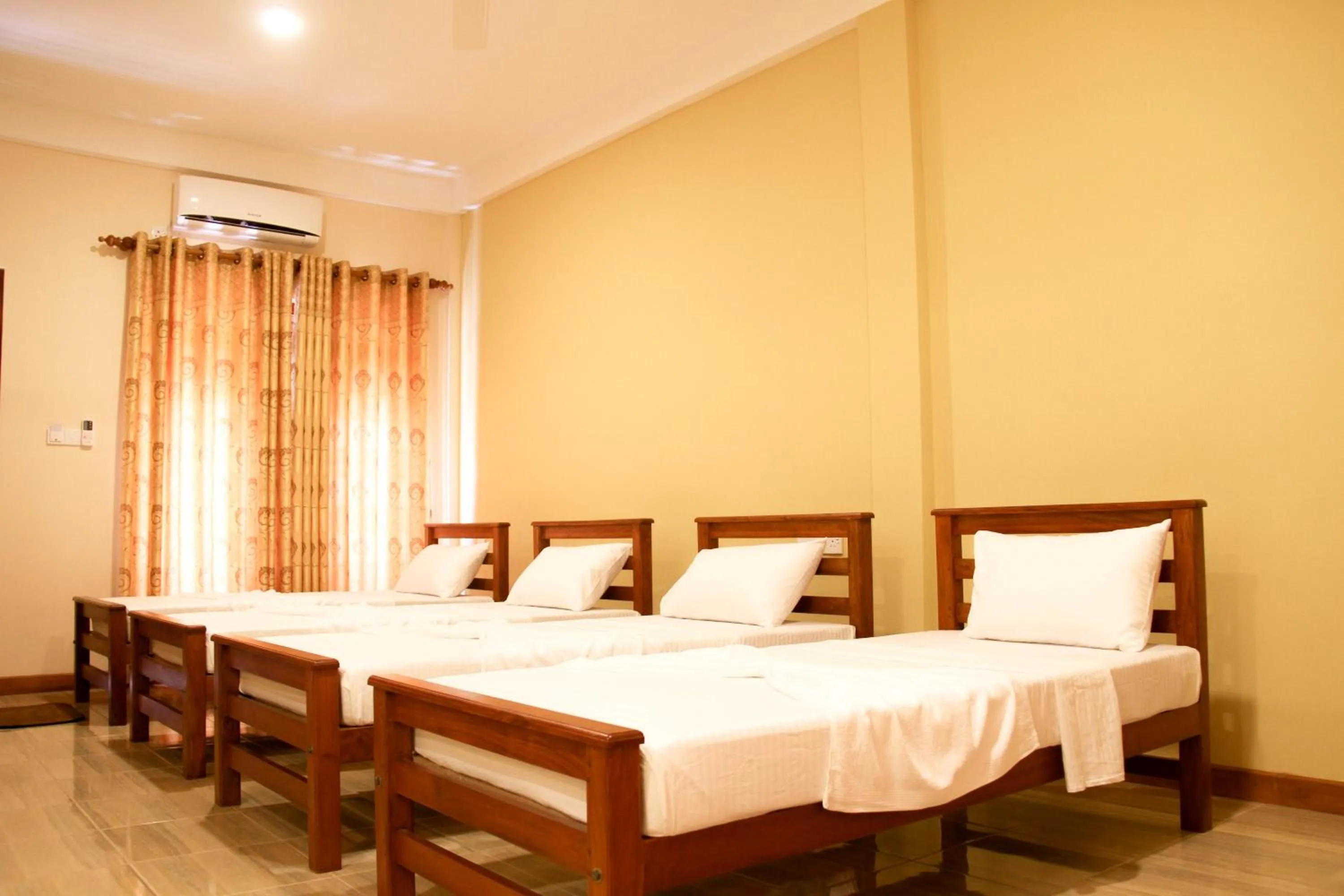 Bed in Hotel Nilketha Yala Tissamaharama