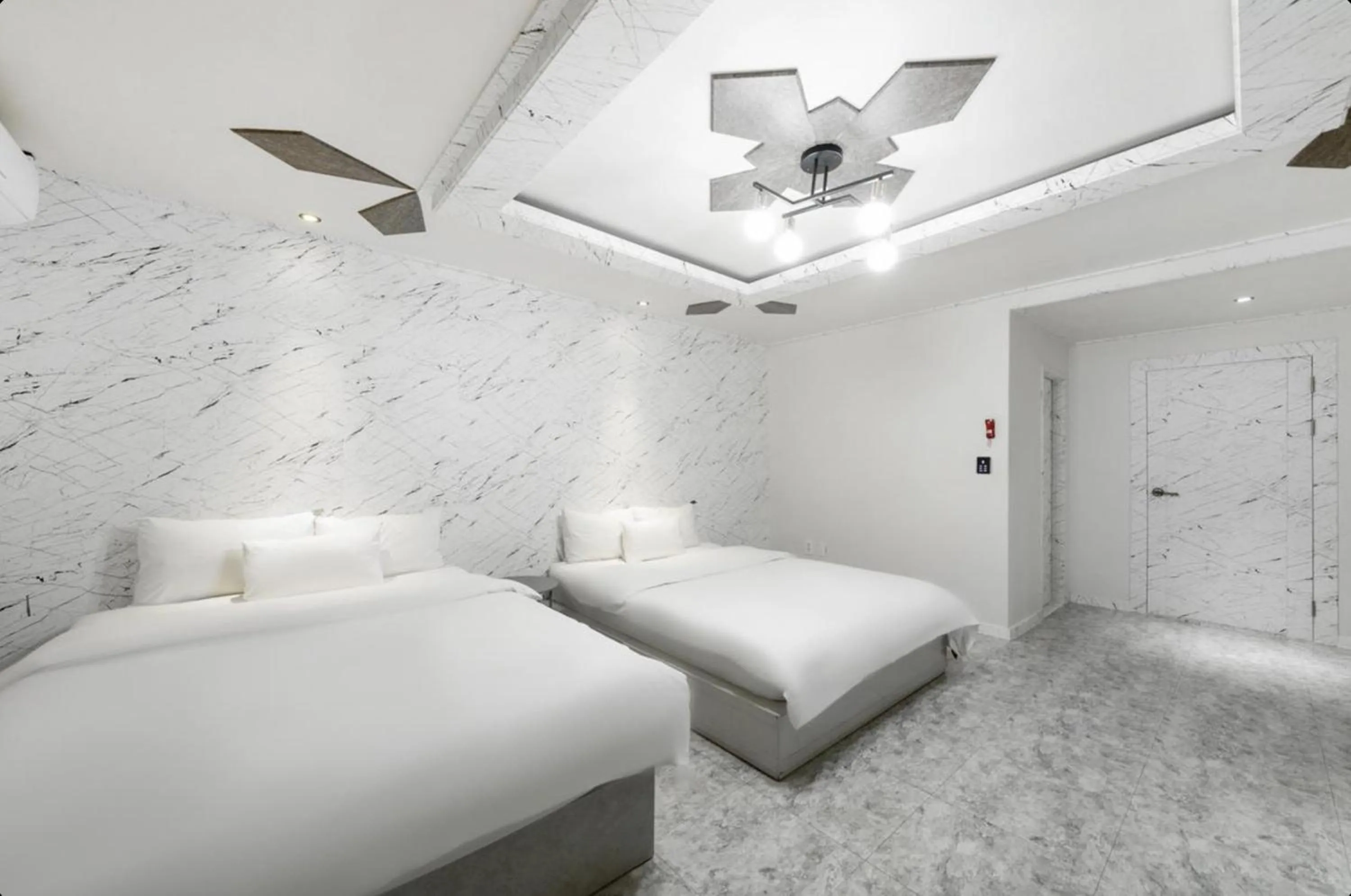 Bed in Gunsan Reborn Hotel