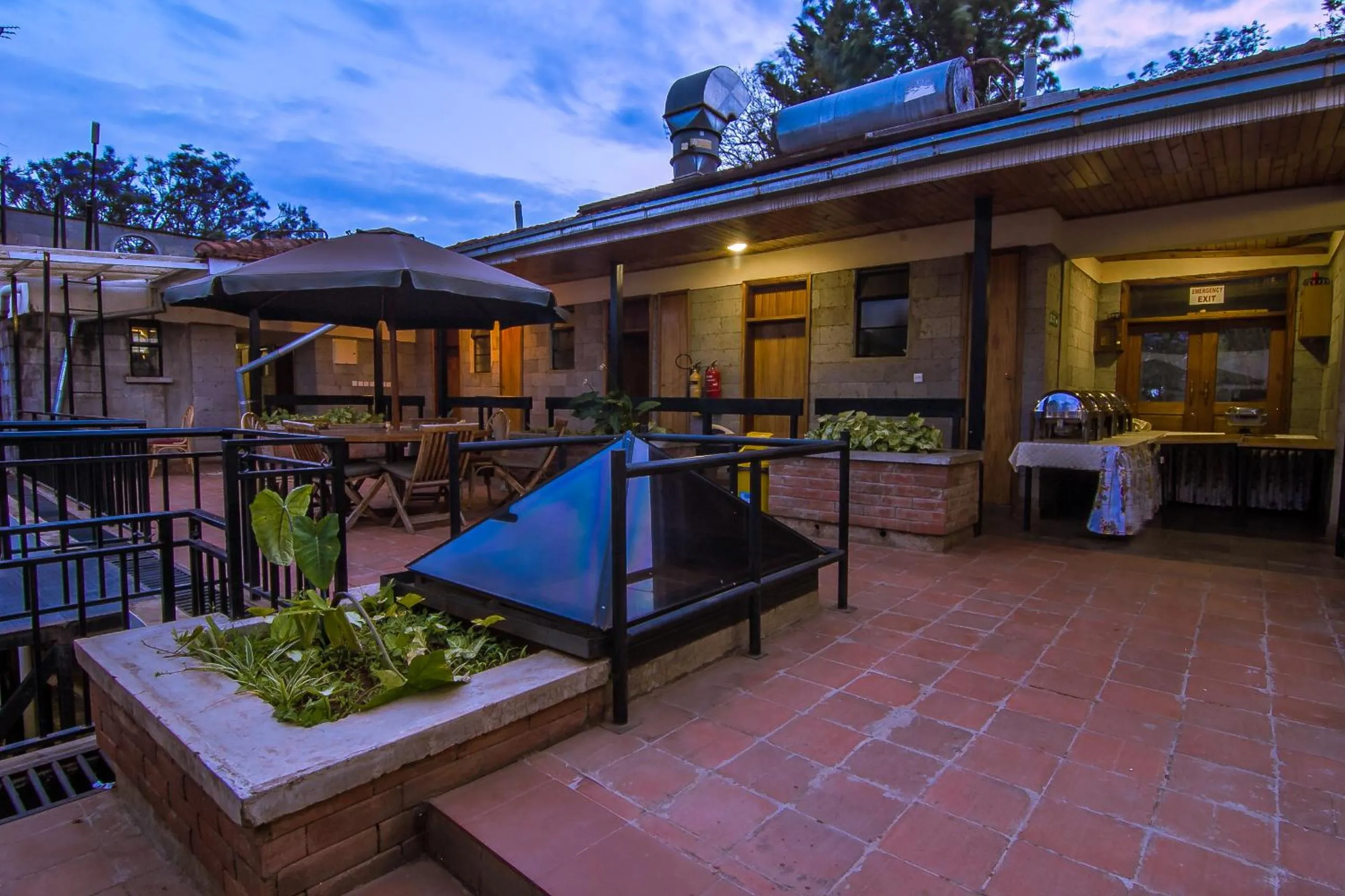 Communal lounge/ TV room in Chak Guesthouse & Conference Center