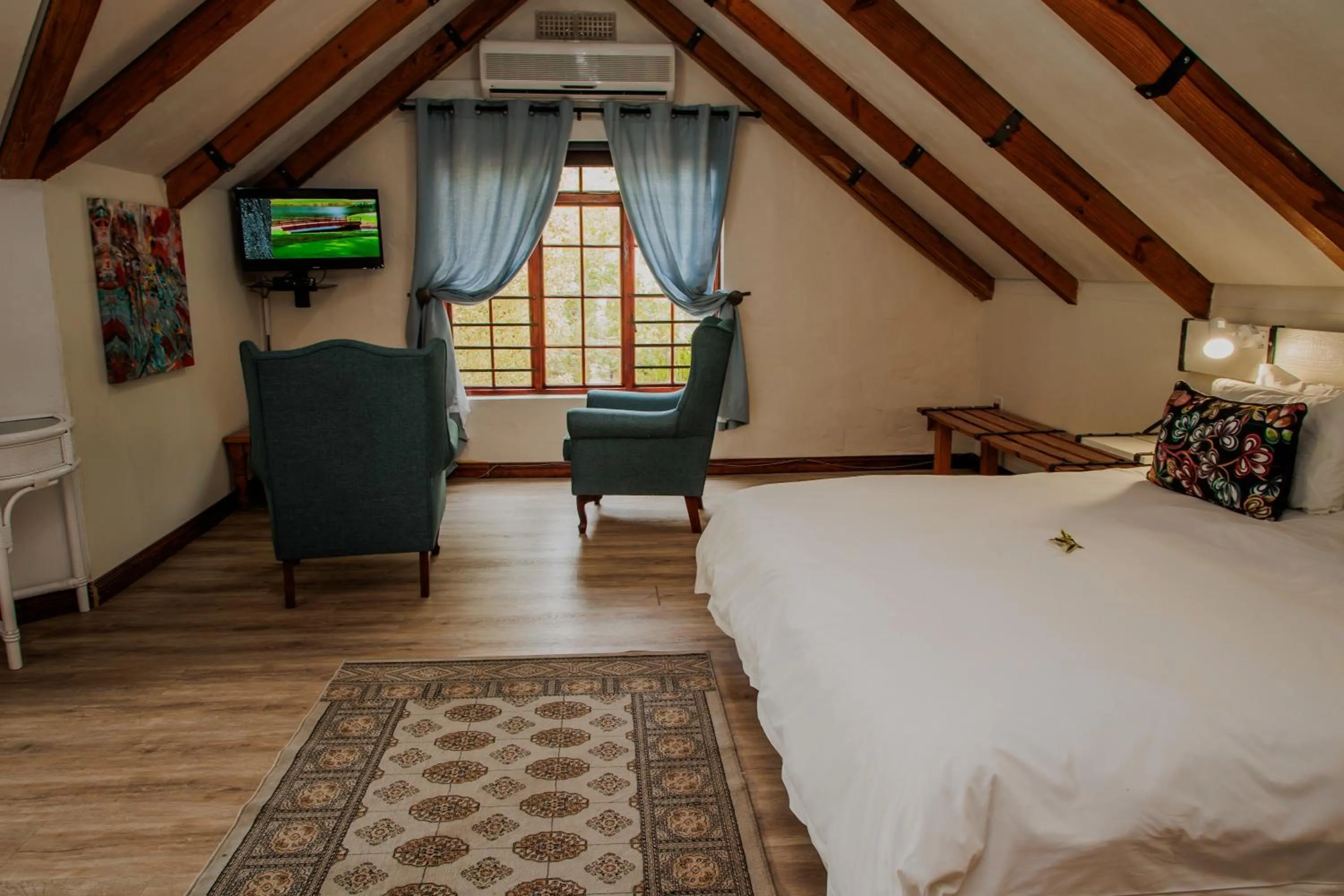 Bed in Aan de Oever Guesthouse